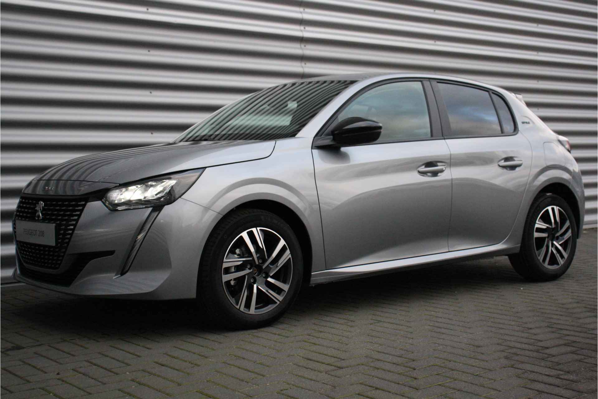 Peugeot 208 1.2 PURETECH 75PK STYLE / NAVI / AIRCO / LED / PDC / 16" LMV / CAMERA / DIRECT LEVERBAAR / €4.276,- VOORDEEL !! - 6/33