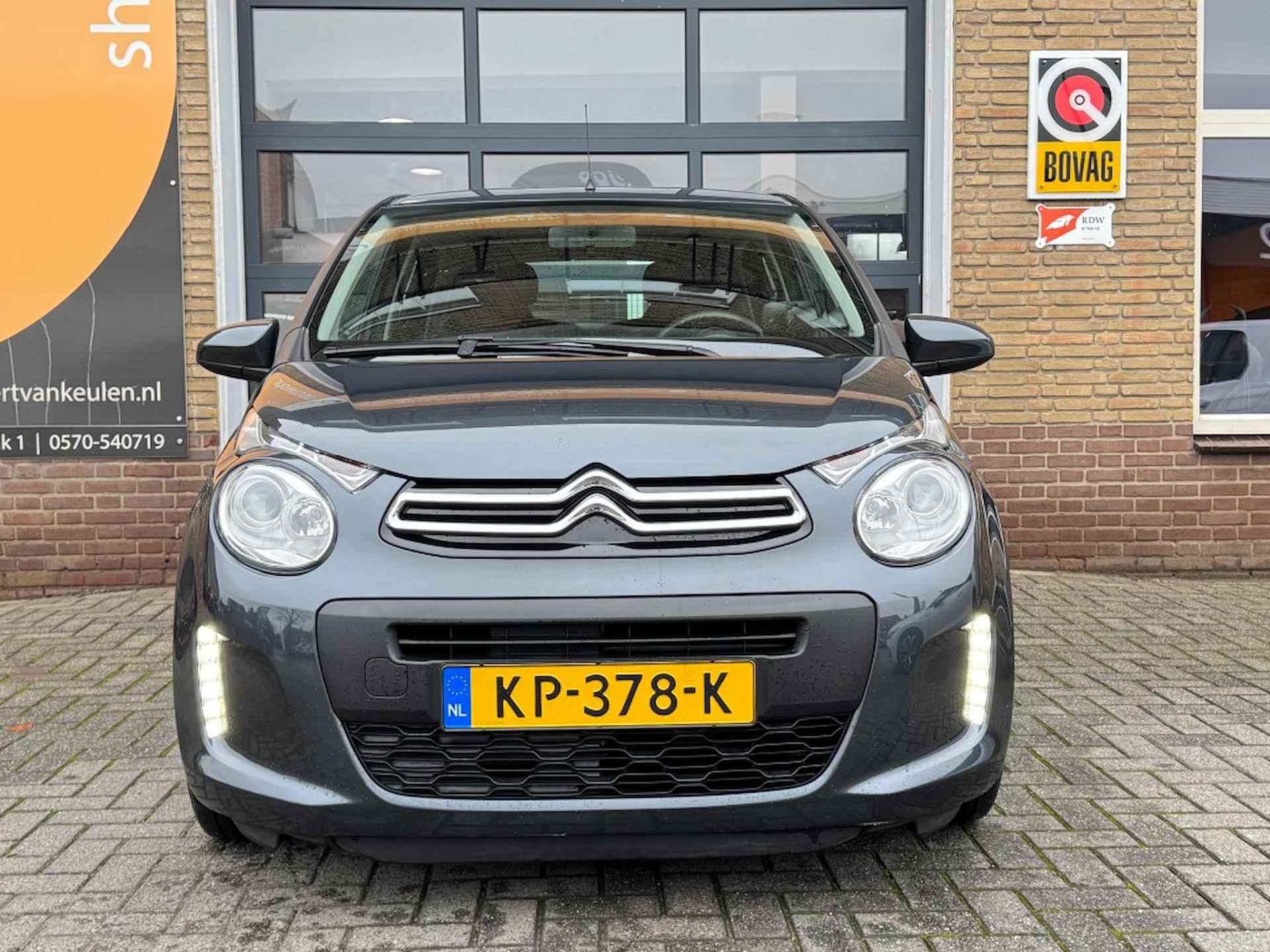 CITROEN C1 1.0 e-VTI FEEL 5-DEURS AIRCO/NAVIGATIE/PDC/NL-AUTO/1e EIG./64.00 - 2/13