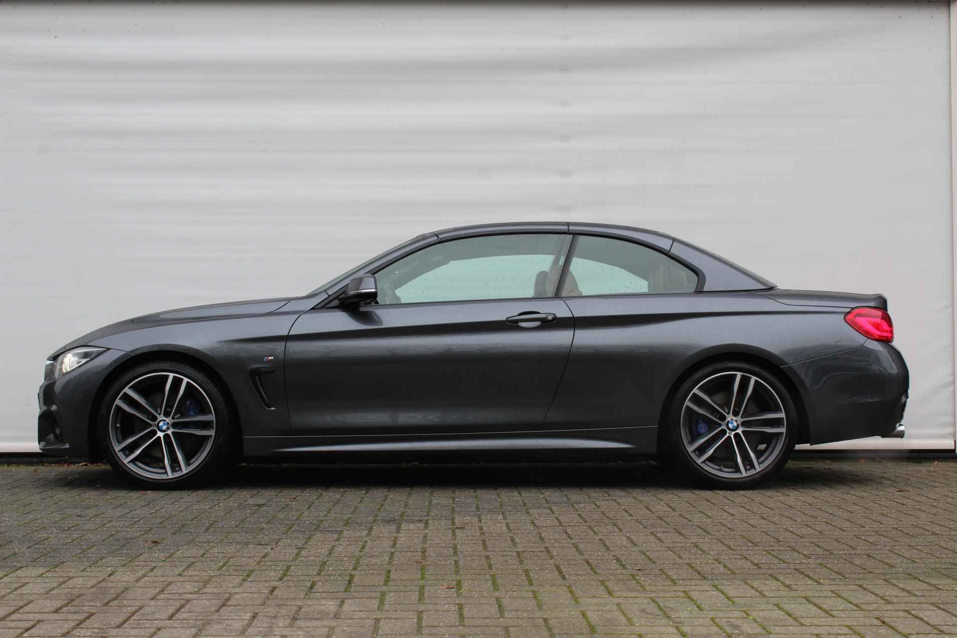 BMW 4 Serie Cabrio 420i High Executive M Sport Automaat / Air Collar / Achteruitrijcamera / Sportstoelen / Apple CarPlay / Park Assistant / Stoelverwarming - 3/34