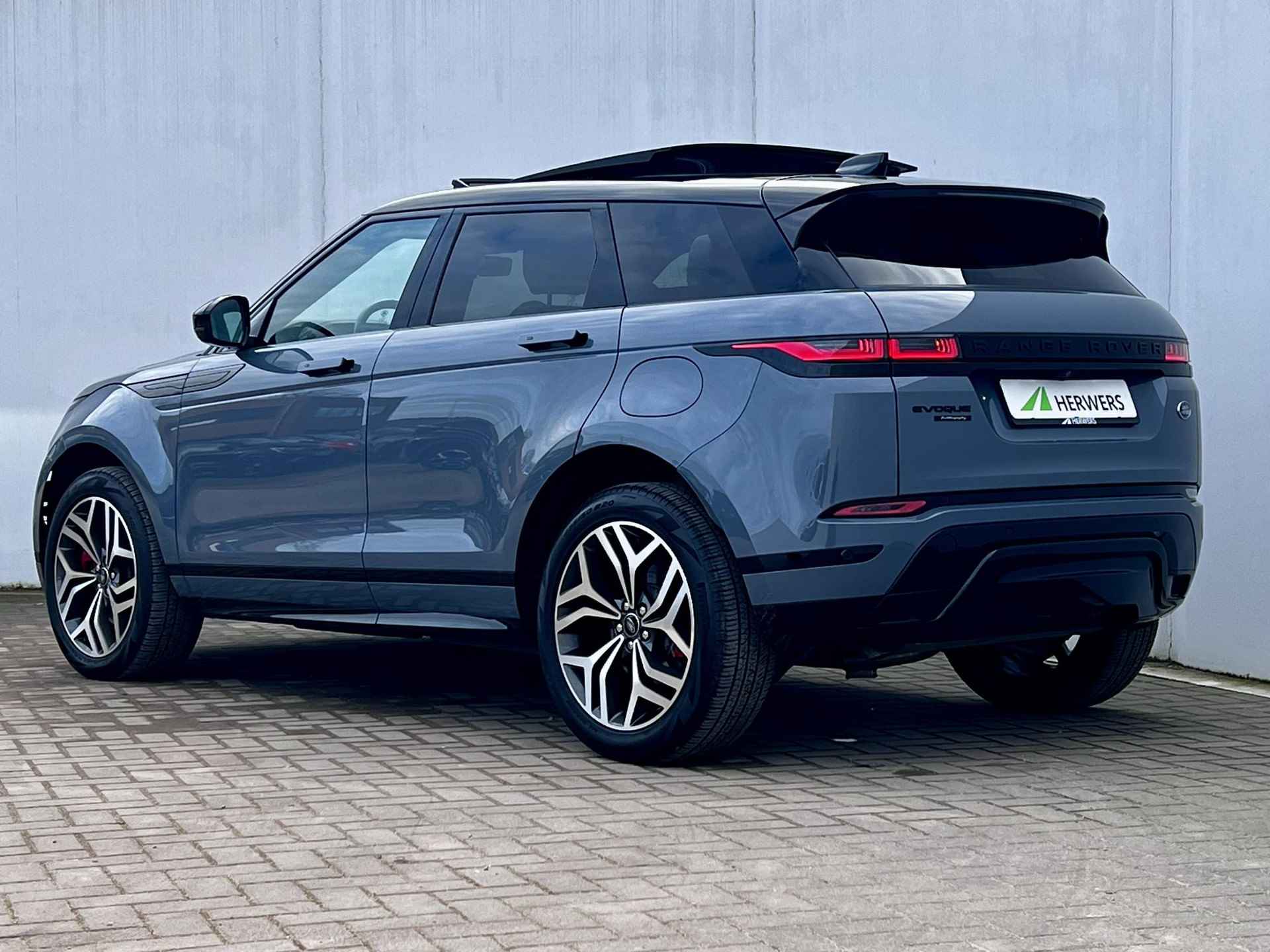 Land Rover Range Rover Evoque 1.5 P300e AWD 308 pk Autobiography / Dealer onderhouden / PHEV CCS Snelladen / Panorama schuifdak / Trekhaak Elektrisch 1.600 kg / Leder / Meridian Audio / Zeer compleet / All Seaon banden / - 63/64