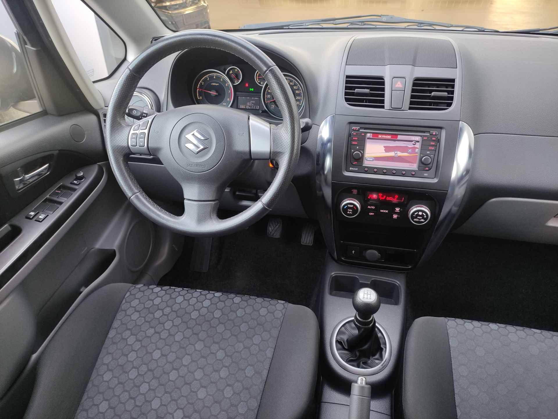 Suzuki SX4 1.6 i-AWD Executive (4WD) - navigatie - trekhaak - keyless - 7/31