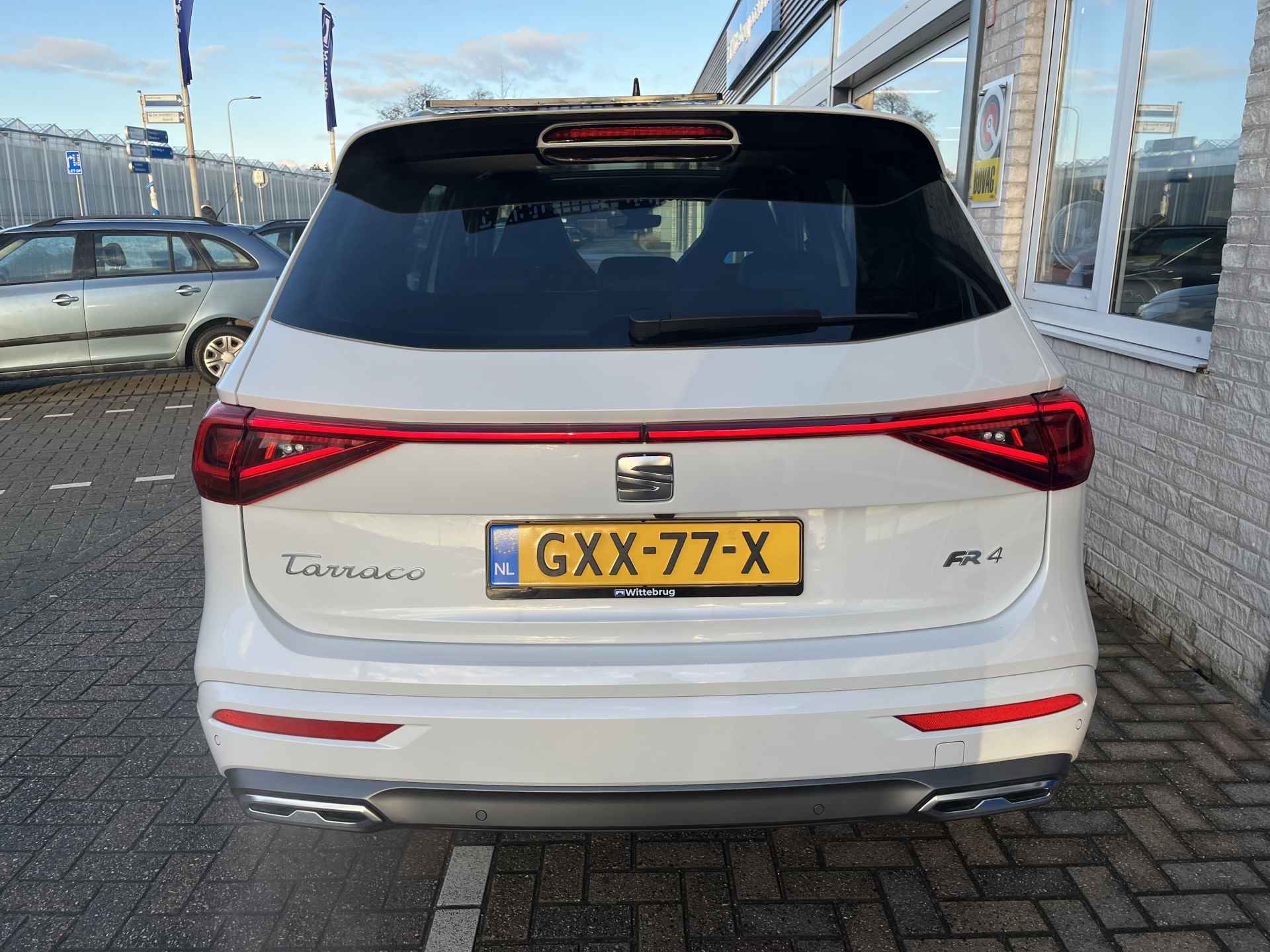 SEAT Tarraco 1.4 TSI e-Hybrid PHEV FR Business / AUTOMAAT/ FABRIEKS GARANTIE T/M 4-2026/ 10.000 KM/ PANO/ TREKHAAK/ CAMERA/ PARK. SENSOREN/ DCC/ MATRIX/ MEMORY SEATS/ KEYLESS/ STOELVERWARM. V&A/ ADAPT. CRUISE/ APP CONNECT/ NAVI/ CLIMA/ - 35/42