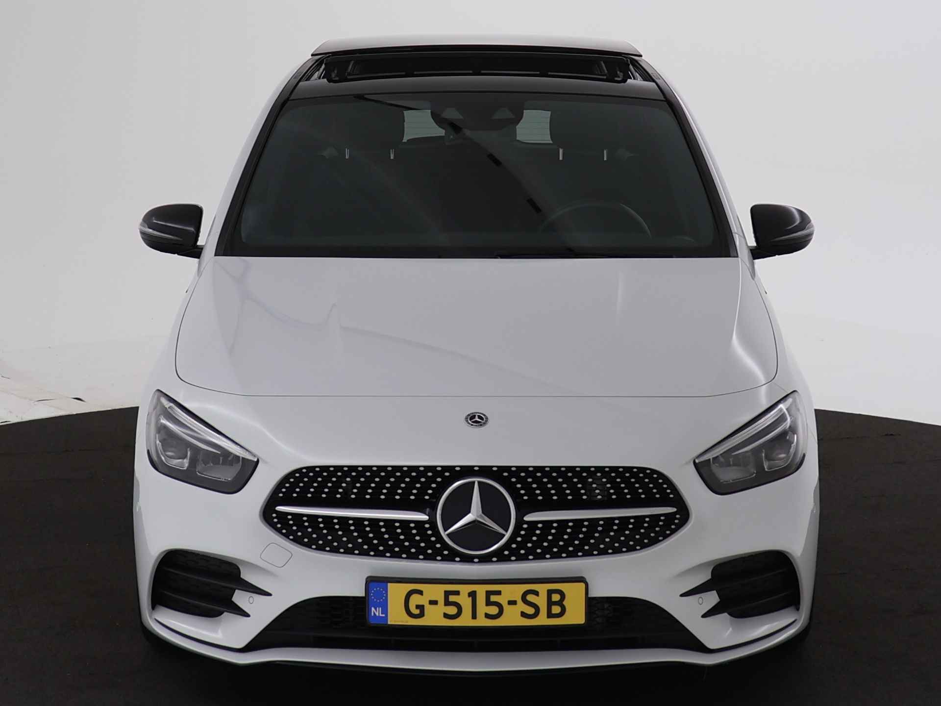 Mercedes-Benz B-Klasse 180 Business Solution AMG | Panoramadak | Navigatie | Stoelverwarming | Parkeersensoren | Camera | Inclusief 24 maanden MB Certified garantie voor Europa. - 28/44