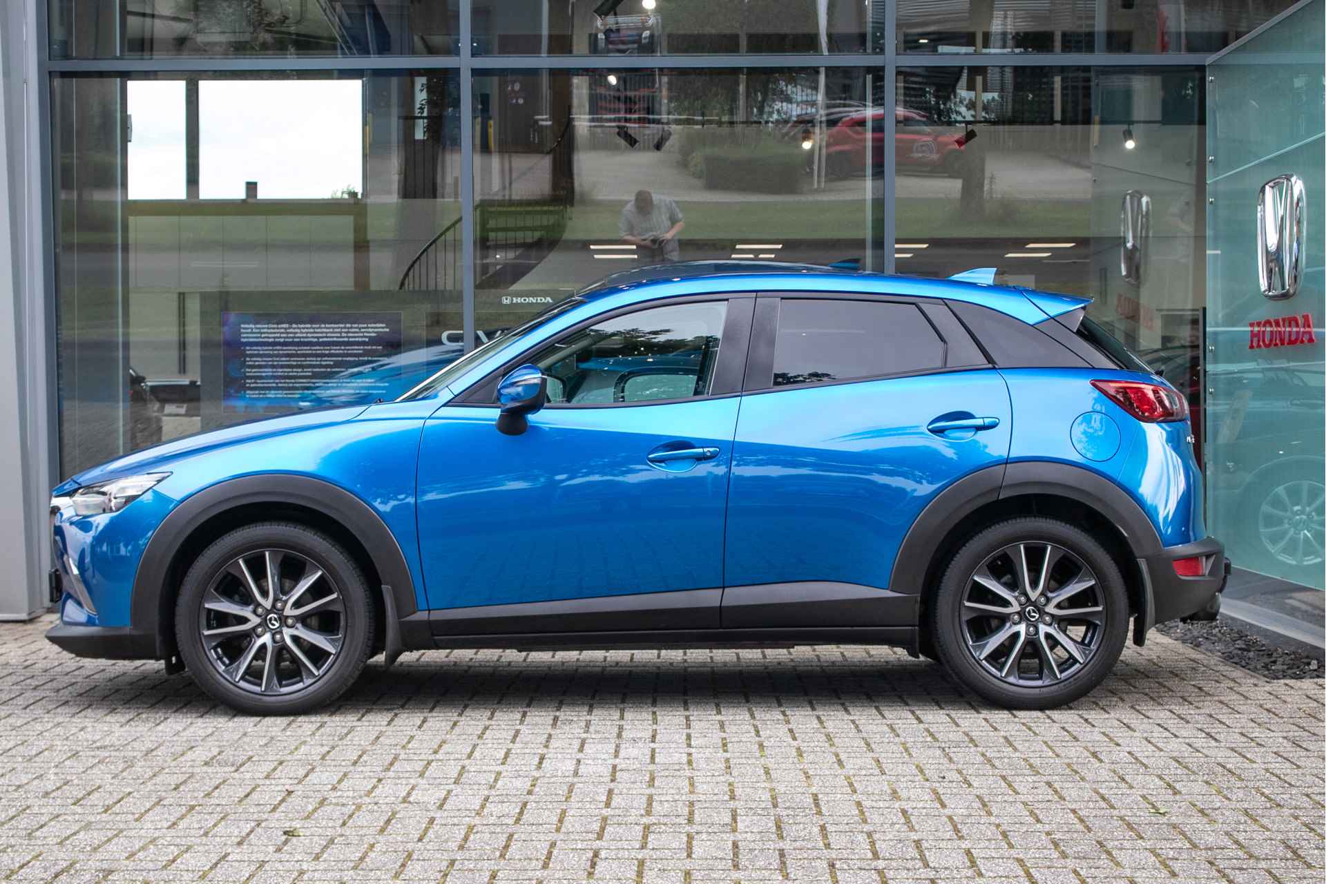 Mazda CX-3 2.0 SkyActiv-G 120 TS+ All-in rijklaarprijs | Trekhaak | Navi | Nette staat - 2/37