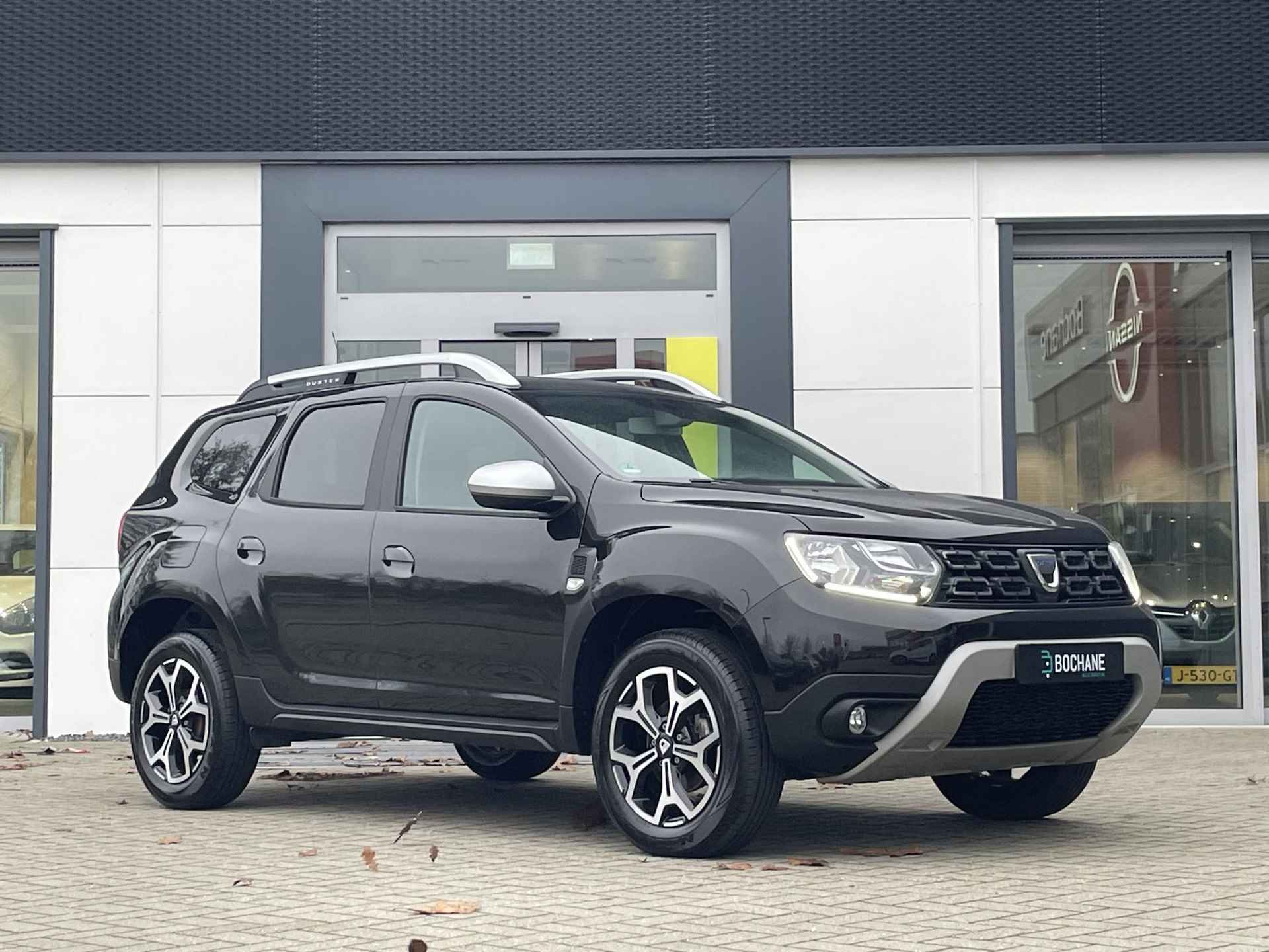 Dacia Duster 1.2 TCe Prestige | Lederen bekleding | Cruise control | - 5/31