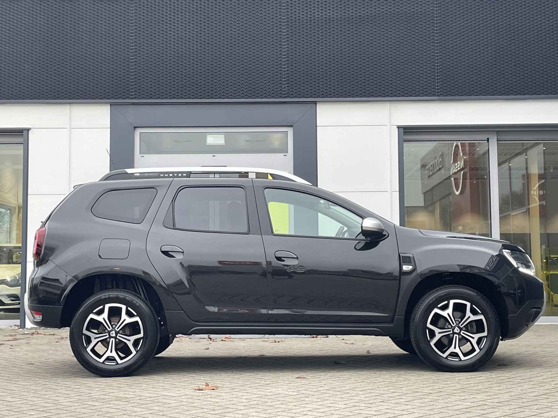 Dacia Duster 1.2 TCe Prestige | Lederen bekleding | Cruise control | - 13/31