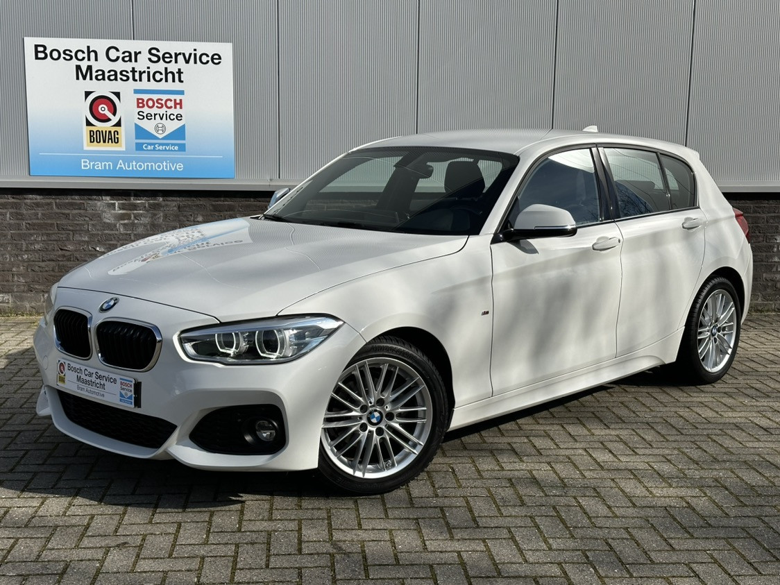 BMW 1-serie 118i M-sport | Executive | Touch i-drive | Car-play | Interesse, Proefrit? Bel of app met: 06-24 28 28 42