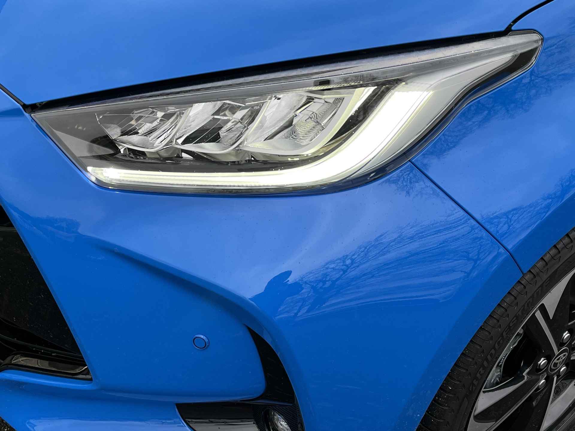 Toyota Yaris Hybrid 130 Launch Edition | Demonstratie auto | 130PK Hybrid | Neptune blue metallic met zwart dak | - 23/26
