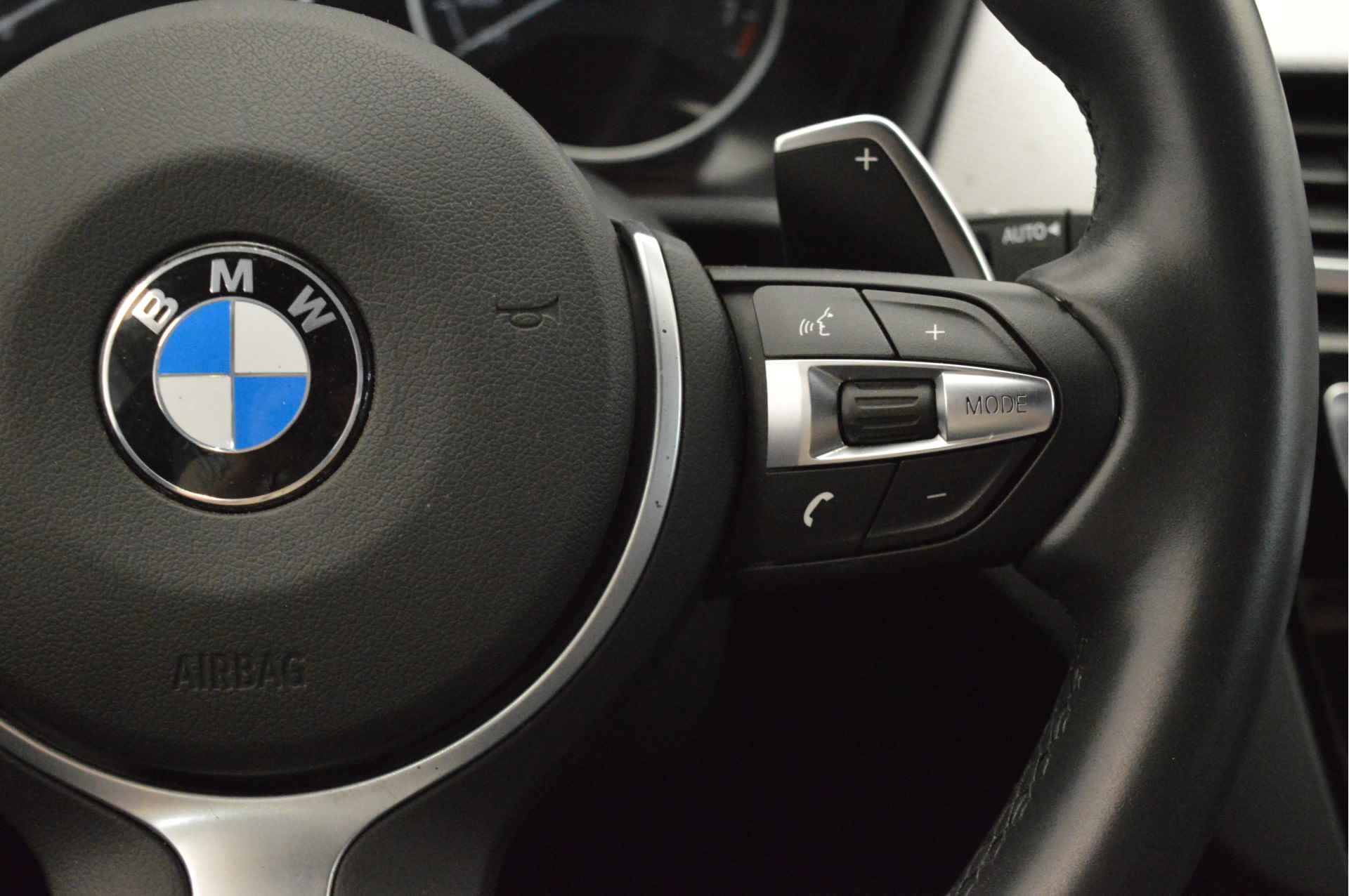 BMW X1 xDrive20i High Executive M Sport Automaat / Panoramadak / Trekhaak / LED / Head-Up / Adaptief onderstel / LED / Sportstoelen / Navigatie Plus / Achteruitrijcamera - 11/25