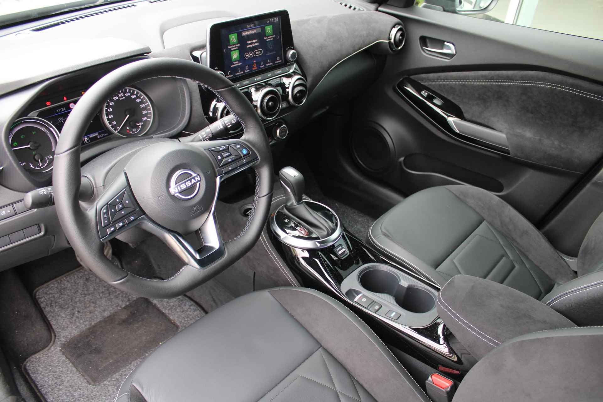 Nissan Juke 1.6 Hybrid N-Design 143PK AUTOMAAT | Navigatie | Pro Pilot | Climate control | 360 camera | Parkeersensoren voor en achter | Dode hoek detectie | Bose speakers (hoofdsteunen) | Leer/alcantara interieur | Lichtmetalen velgen | - 21/56