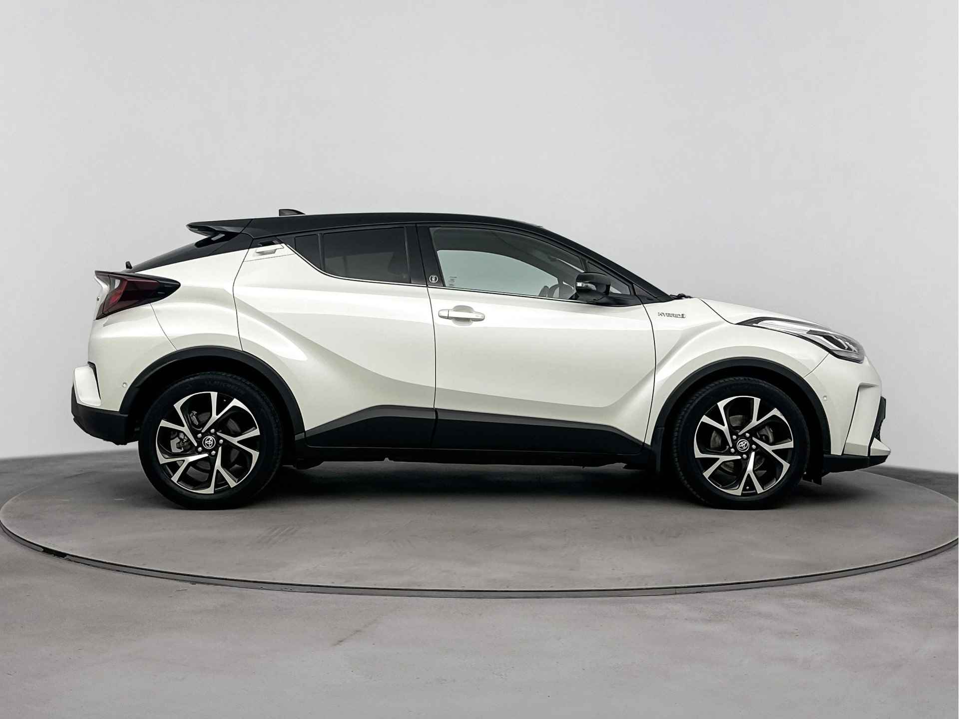 Toyota C-HR 1.8 Hybrid Business Plus Limited | Stuur-/Stoelverwarming | Navigatie | Climate Control | LED | LM velgen | Cruise Control Adaptief | Parkeerhulp | - 14/40