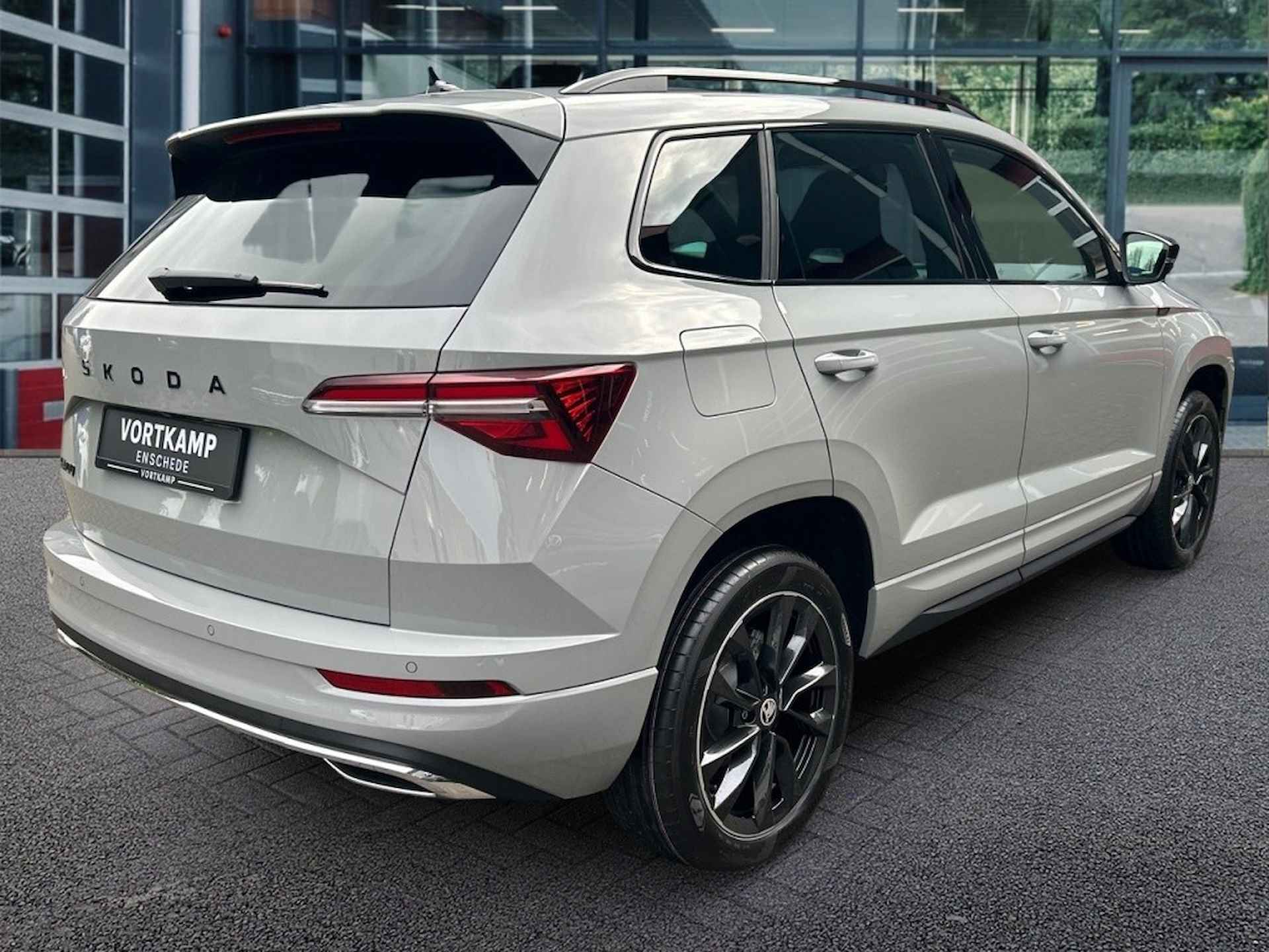 SKODA Karoq 1.5 TSI DSG SPORTLINE TREKHAAK/CAMERA/ACC/STUUR-STOELVERW - 5/28