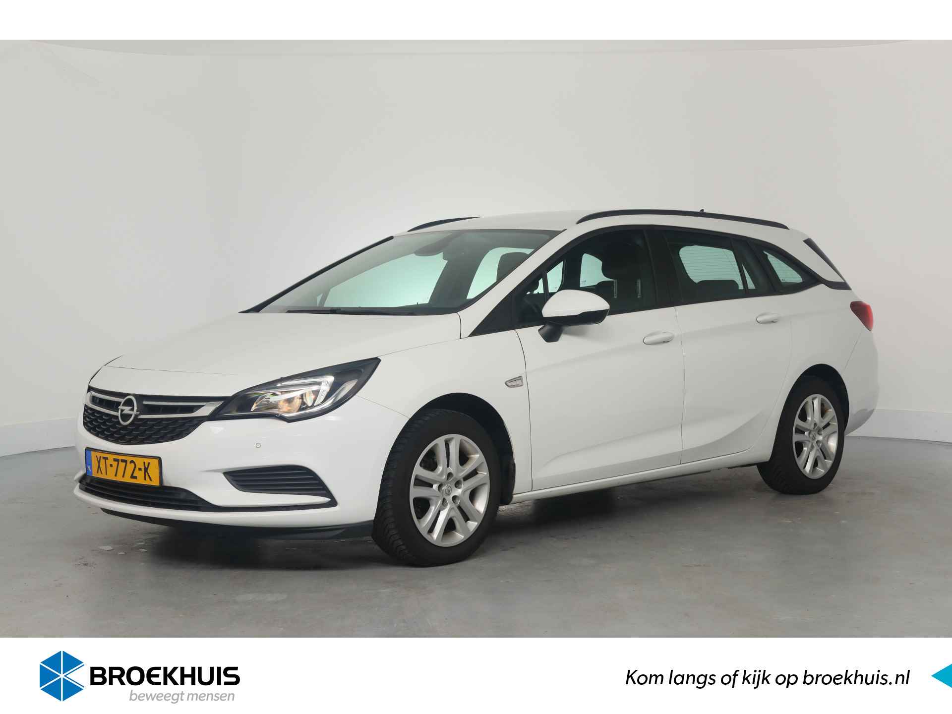 Opel Astra Sports Tourer 1.0 Turbo Online Edition | 1e Eigenaar! | Trekhaak | Navi | AGR | Camera | Cruise Control | Airco | Parkeersensore - 1/2