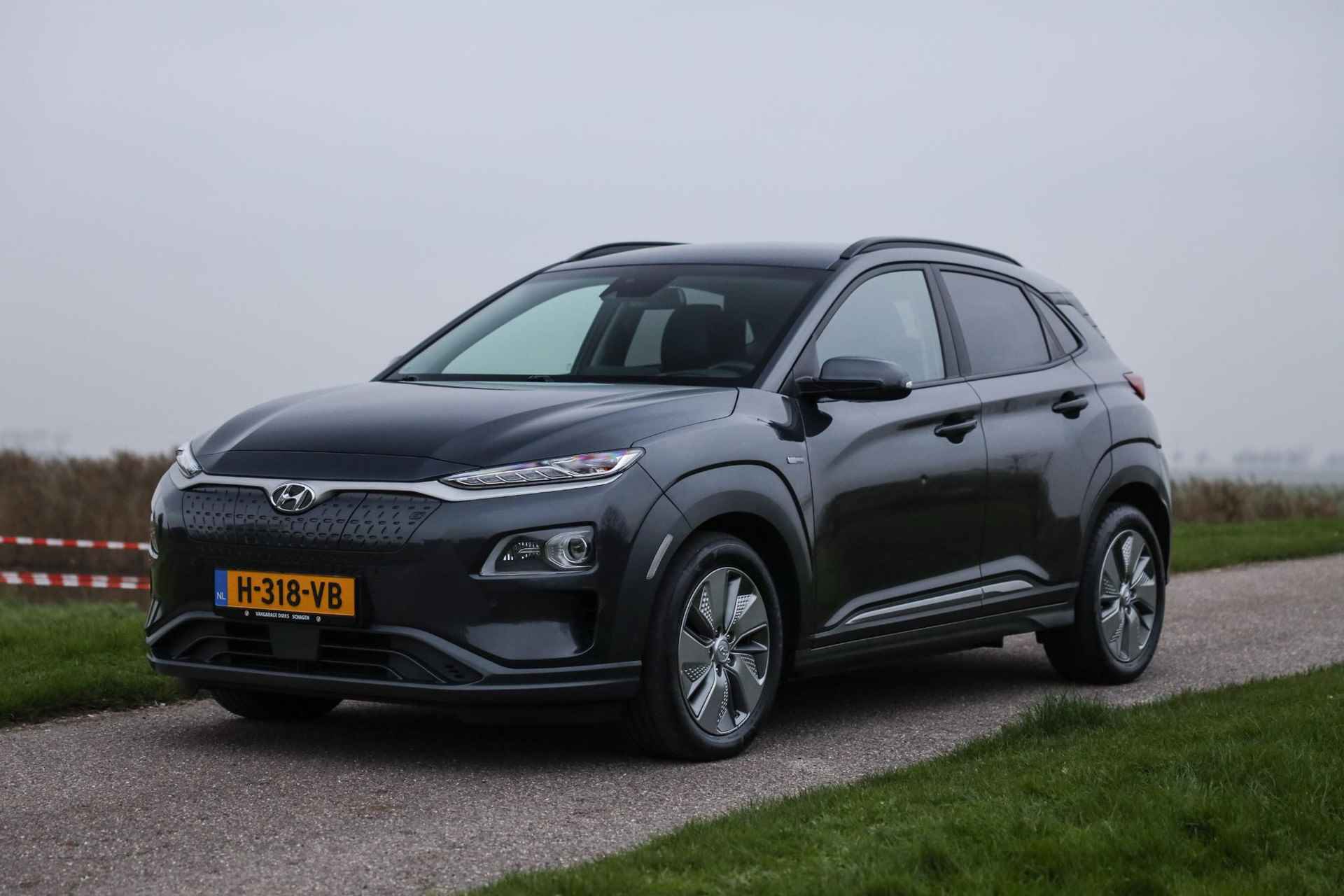 Hyundai Kona EV Premium 3 Fase 64 kWh ✅Leder ✅ Warmtepomp ✅ Carplay - 34/38