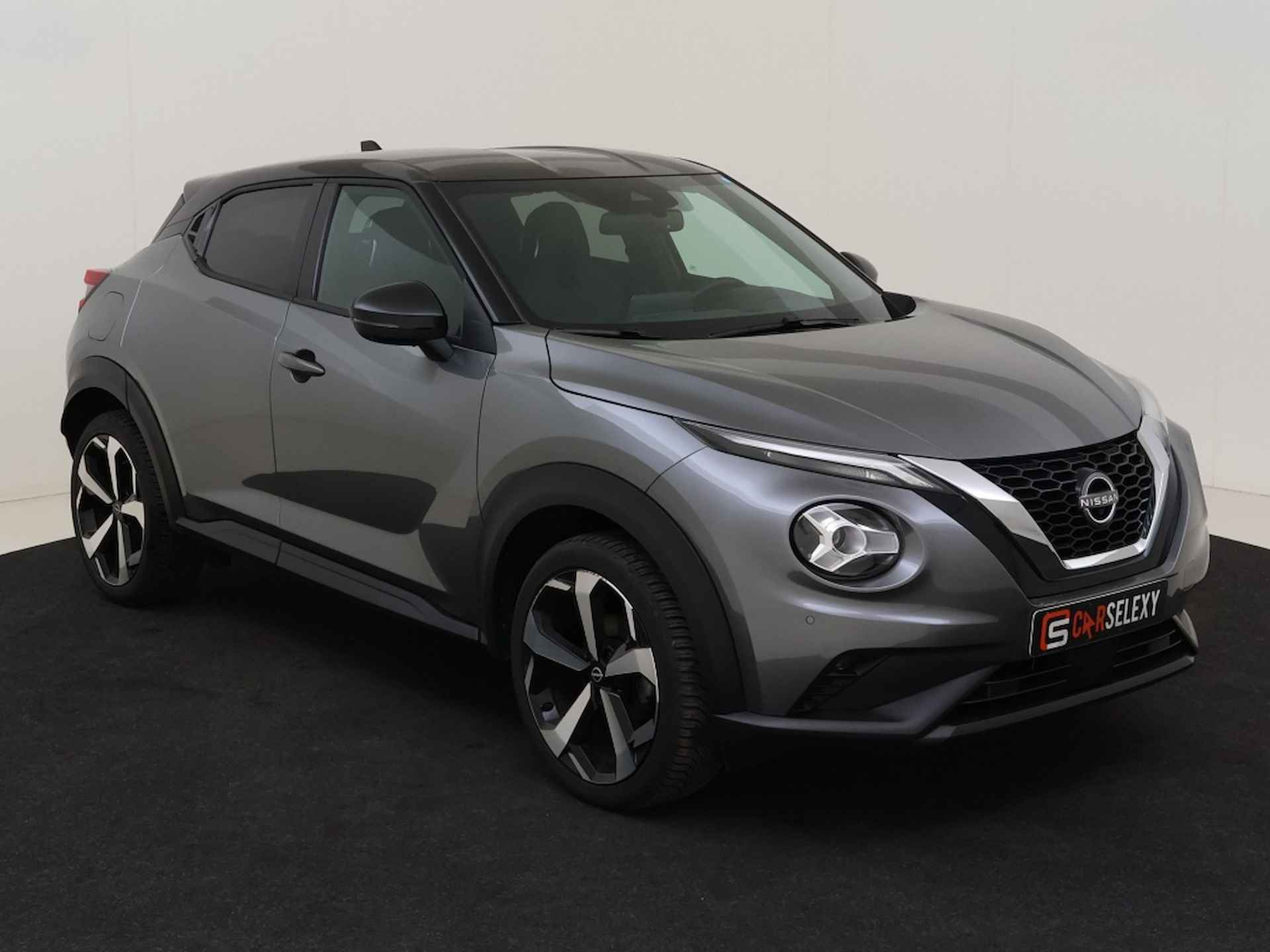 Nissan Juke 1.0 DIG-T Tekna | Automaat | Two Tone - 7/30