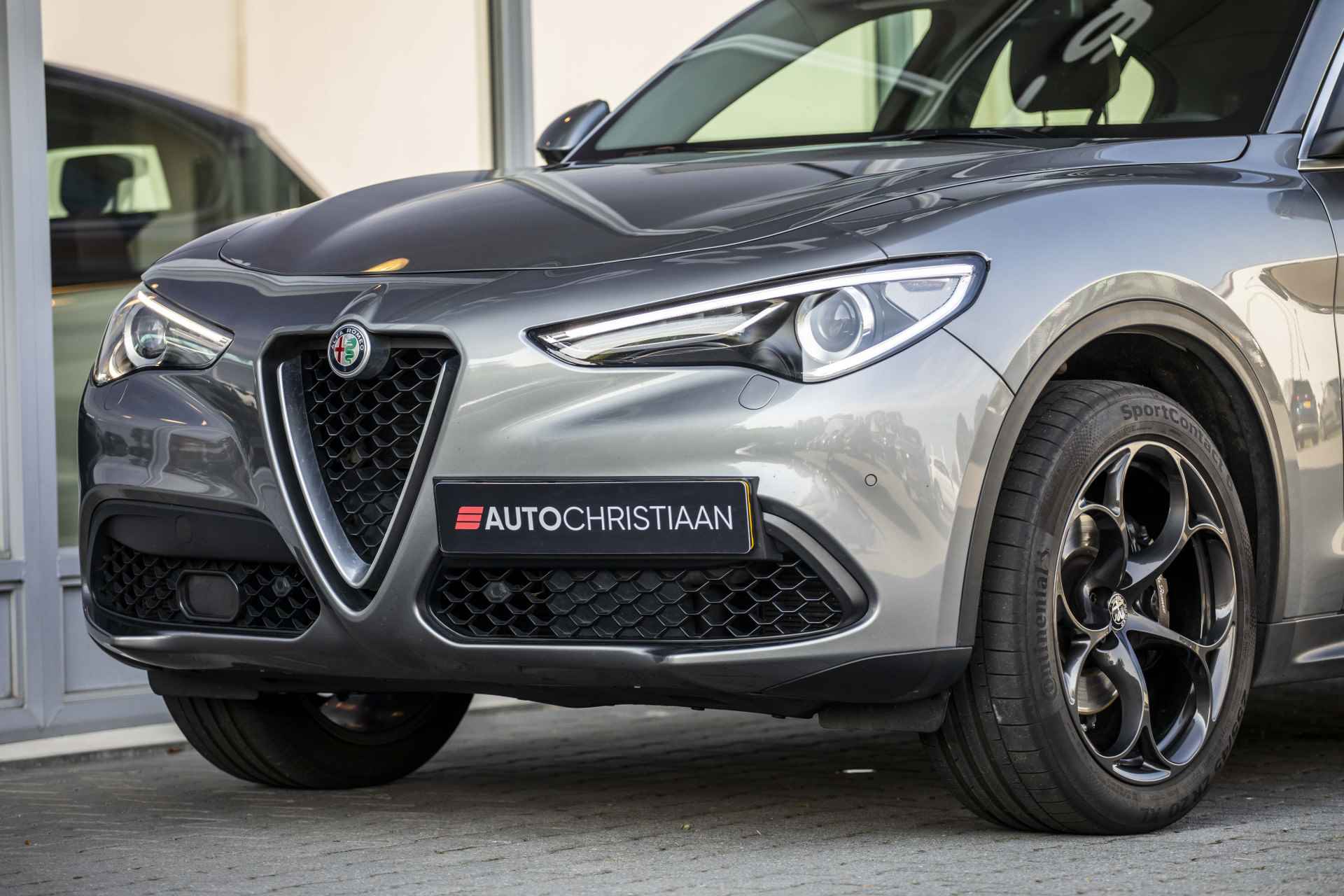 Alfa Romeo Stelvio 2.0 T AWD Super | Bi-Xenon | Camera | 20" | Dodehoek - 14/35