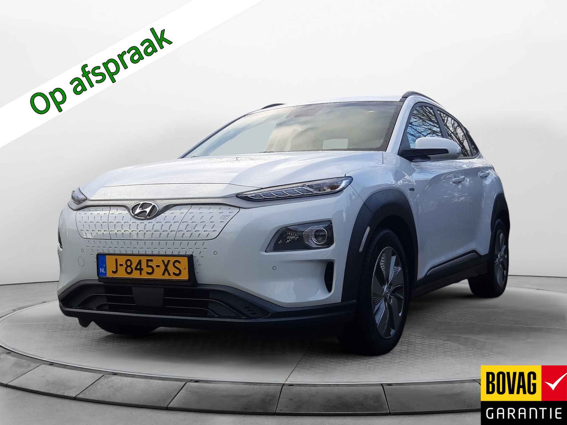 Hyundai KONA EV Premium 64 kWh (204 PK) 2e-Eig, Hyundai-Dealer-Onderh, 12-Mnd-BOVAG, NL-Auto, Leer, Warmtepomp, Navigatie/Apple-Carplay/Android-Auto, Adaptive-Cruisecontrol, Keyless-Entry/Start, Head-Up, Achteruitrijcamera, Parkeer Voorstoelen-Verwarmt/Gevent., Stuurverwarming, Premium-Audio, DAB, Licht-Zicht-pakket, Lm-Velgen, 17Inch, Privacy-Glas - 1/37