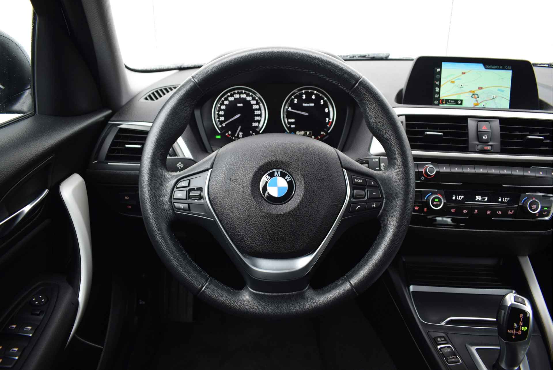 BMW 1-serie 118i Executive Automaat / Sportstoelen / LED / Navigatie / Cruise Control / Multifunctioneel stuurwiel - 14/23