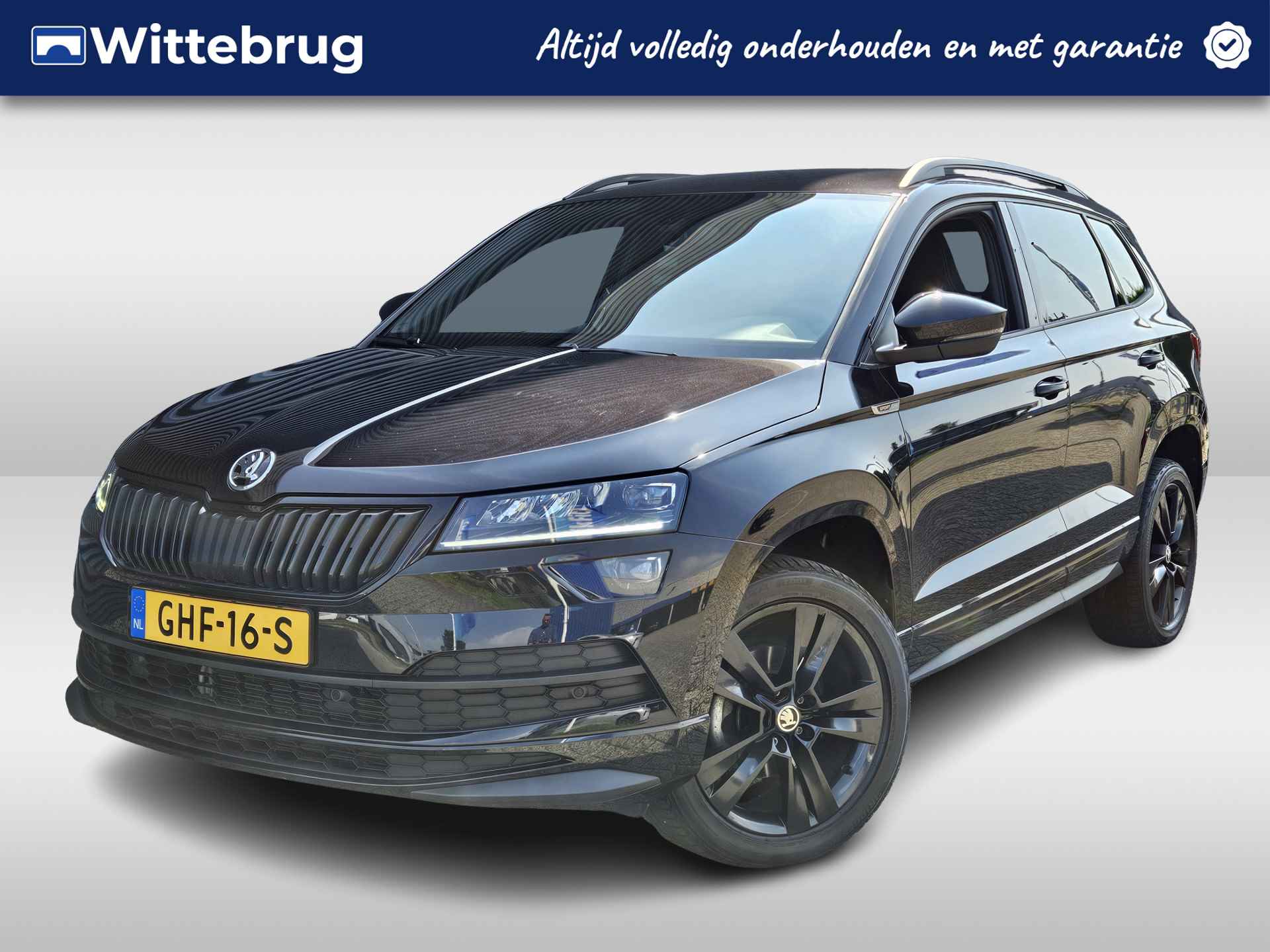 Škoda Karoq 1.5 TSI ACT Sportline Business Black Edition Automaat | Navigatie | Adaptive Cruise Control | Stoel- en Stuurwielverwarming | Camera | - 1/48