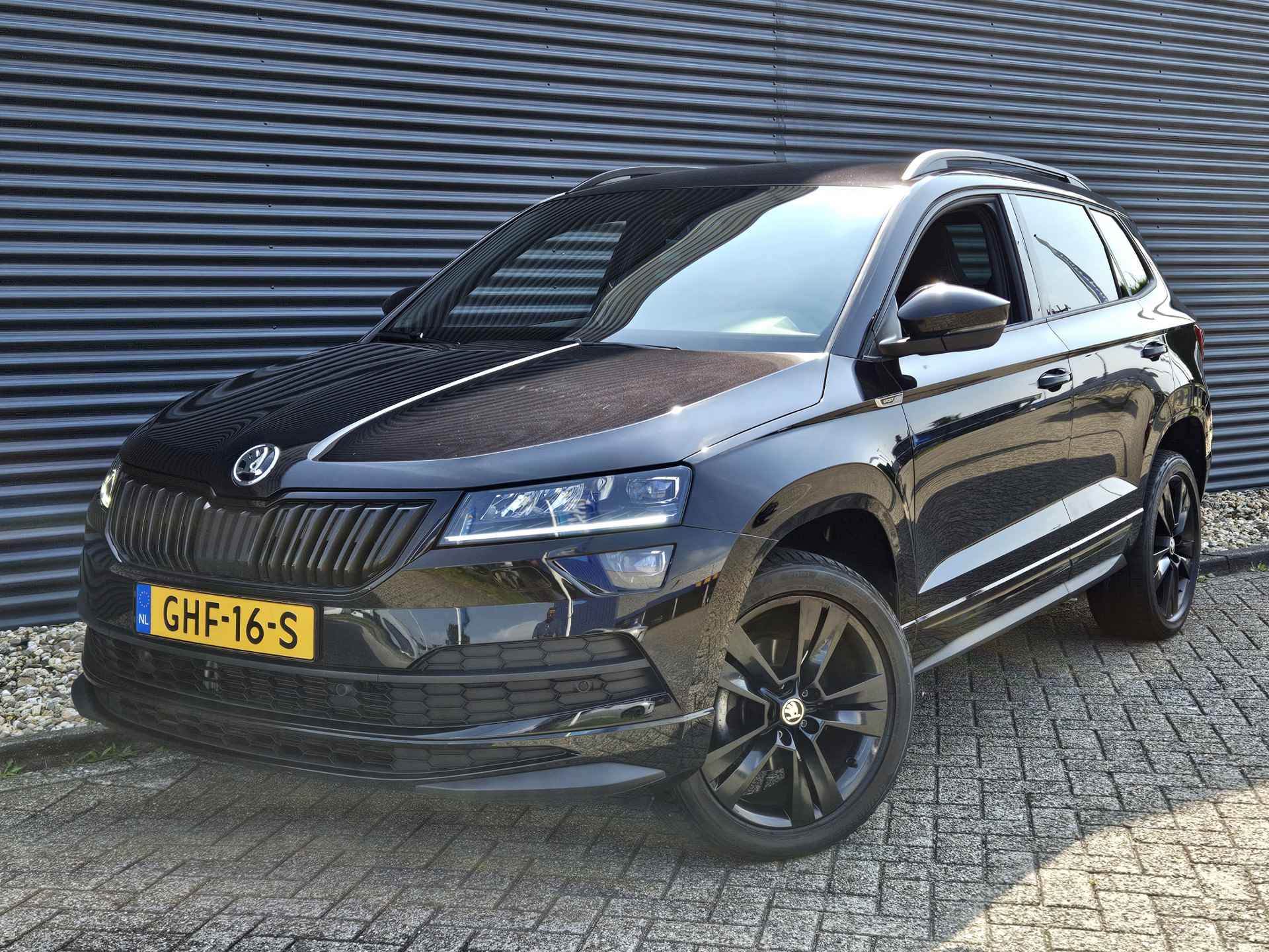 Škoda Karoq 1.5 TSI ACT Sportline Business Black Edition Automaat | Navigatie | Adaptive Cruise Control | Stoel- en Stuurwielverwarming | Camera | - 48/48