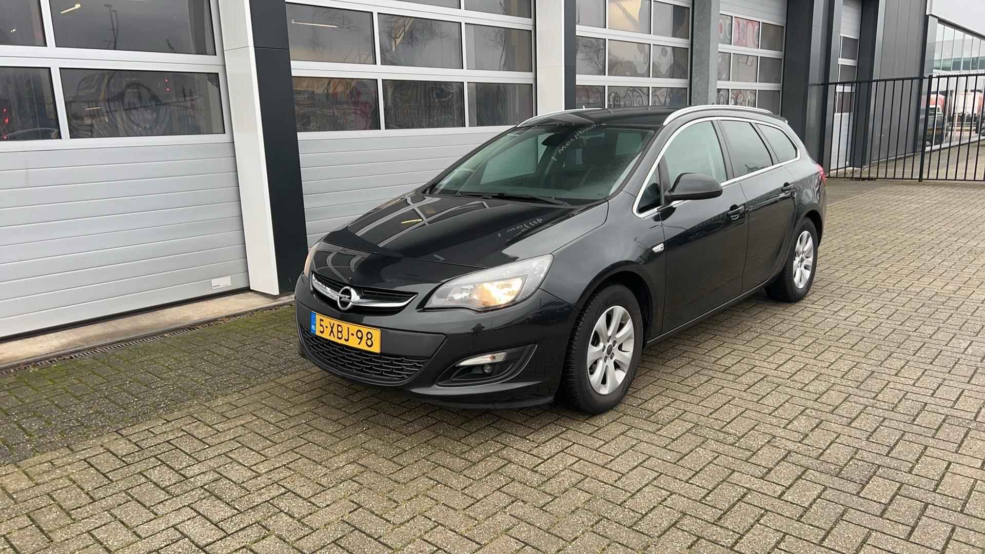 Opel Astra Sports Tourer 1.4 Turbo Business + | NL-auto | Trekhaak | Navigatie | Clima - 4/27