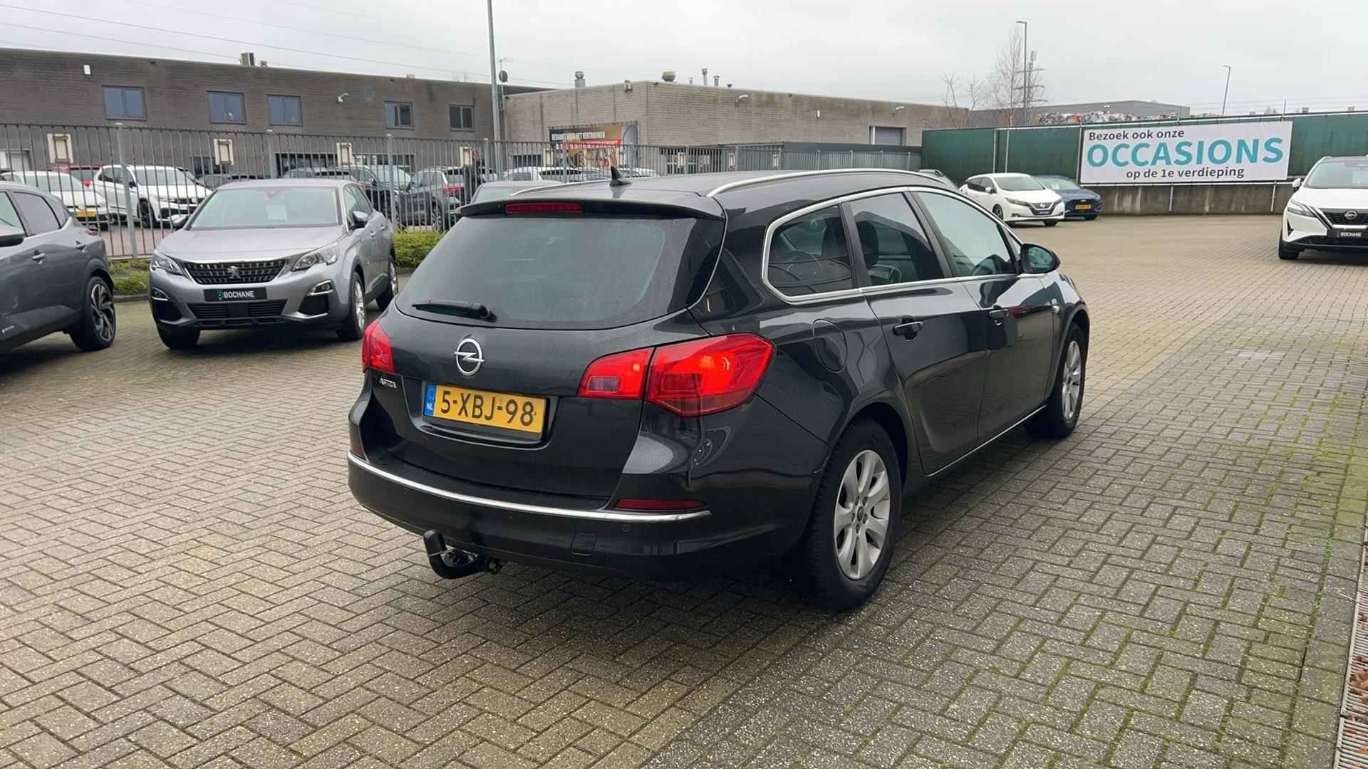 Opel Astra Sports Tourer 1.4 Turbo Business + | NL-auto | Trekhaak | Navigatie | Clima - 7/27