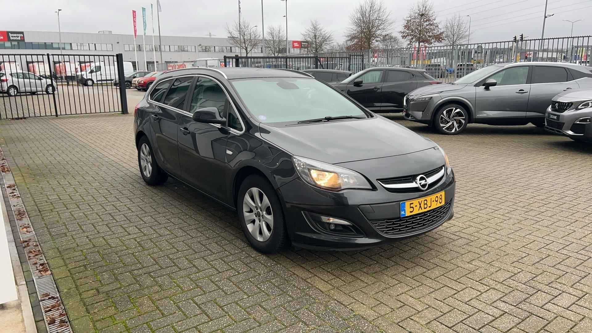 Opel Astra Sports Tourer 1.4 Turbo Business + | NL-auto | Trekhaak | Navigatie | Clima - 8/27