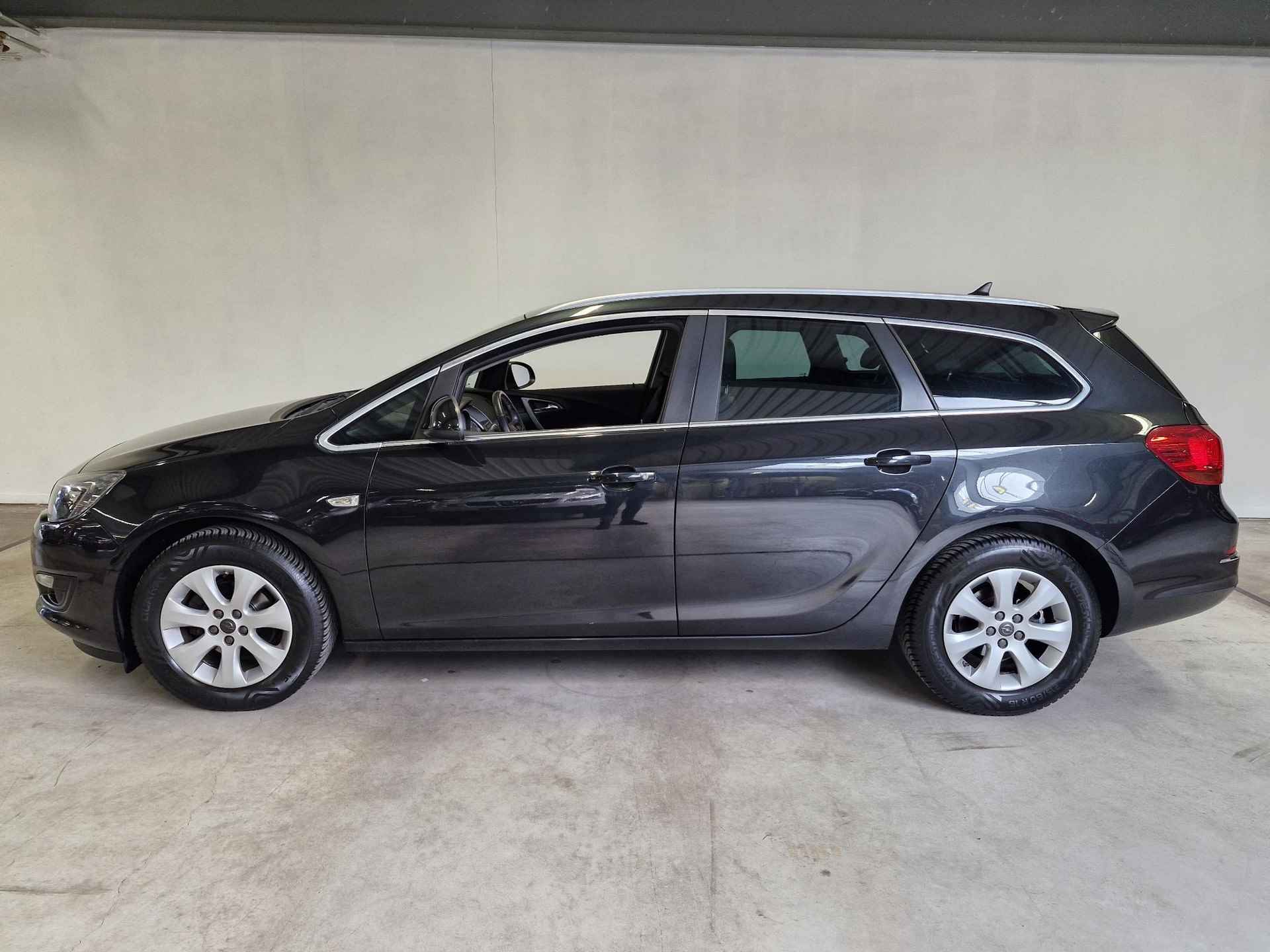 Opel Astra Sports Tourer 1.4 Turbo Business + | NL-auto | Trekhaak | Navigatie | Clima - 10/27