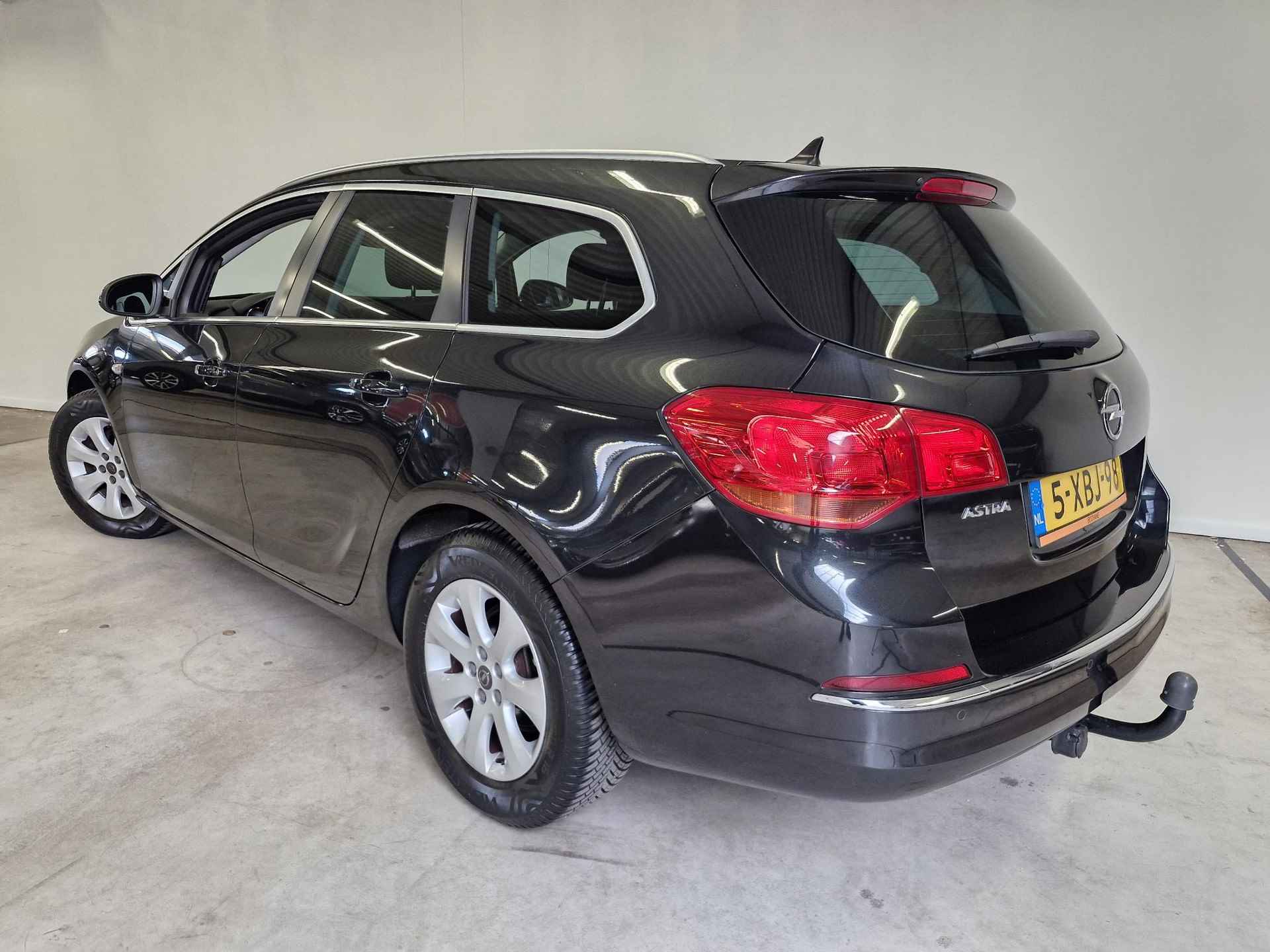 Opel Astra Sports Tourer 1.4 Turbo Business + | NL-auto | Trekhaak | Navigatie | Clima - 11/27