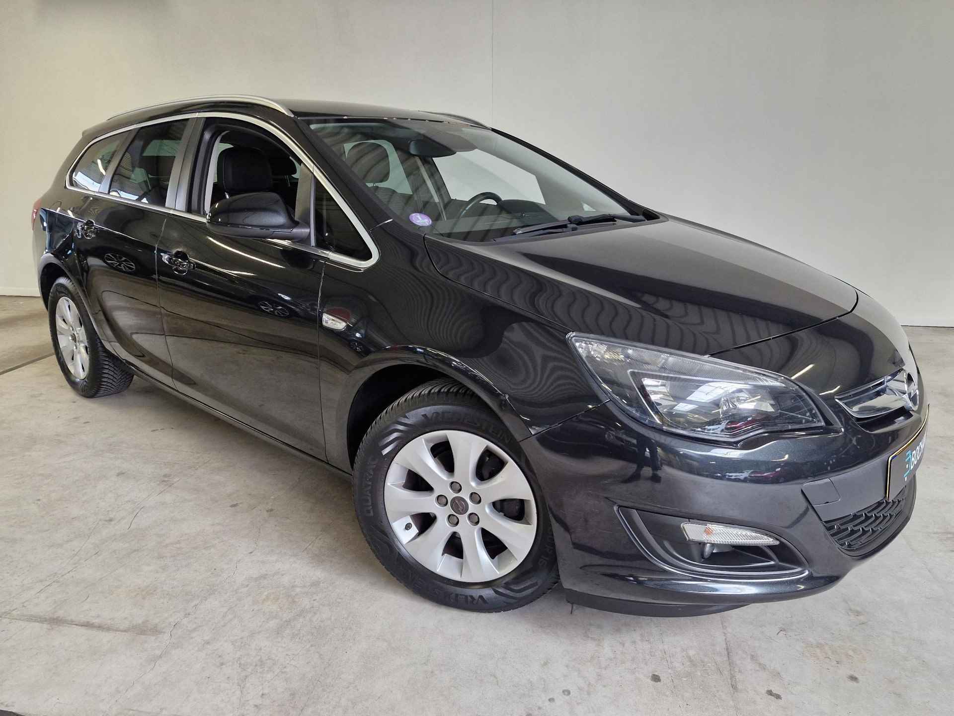 Opel Astra Sports Tourer 1.4 Turbo Business + | NL-auto | Trekhaak | Navigatie | Clima - 14/27