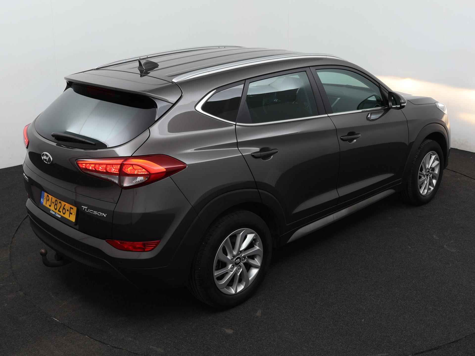 Hyundai Tucson 1.6 GDi Comfort Navigatie | Parkeercamera | Trekhaak | - 31/35