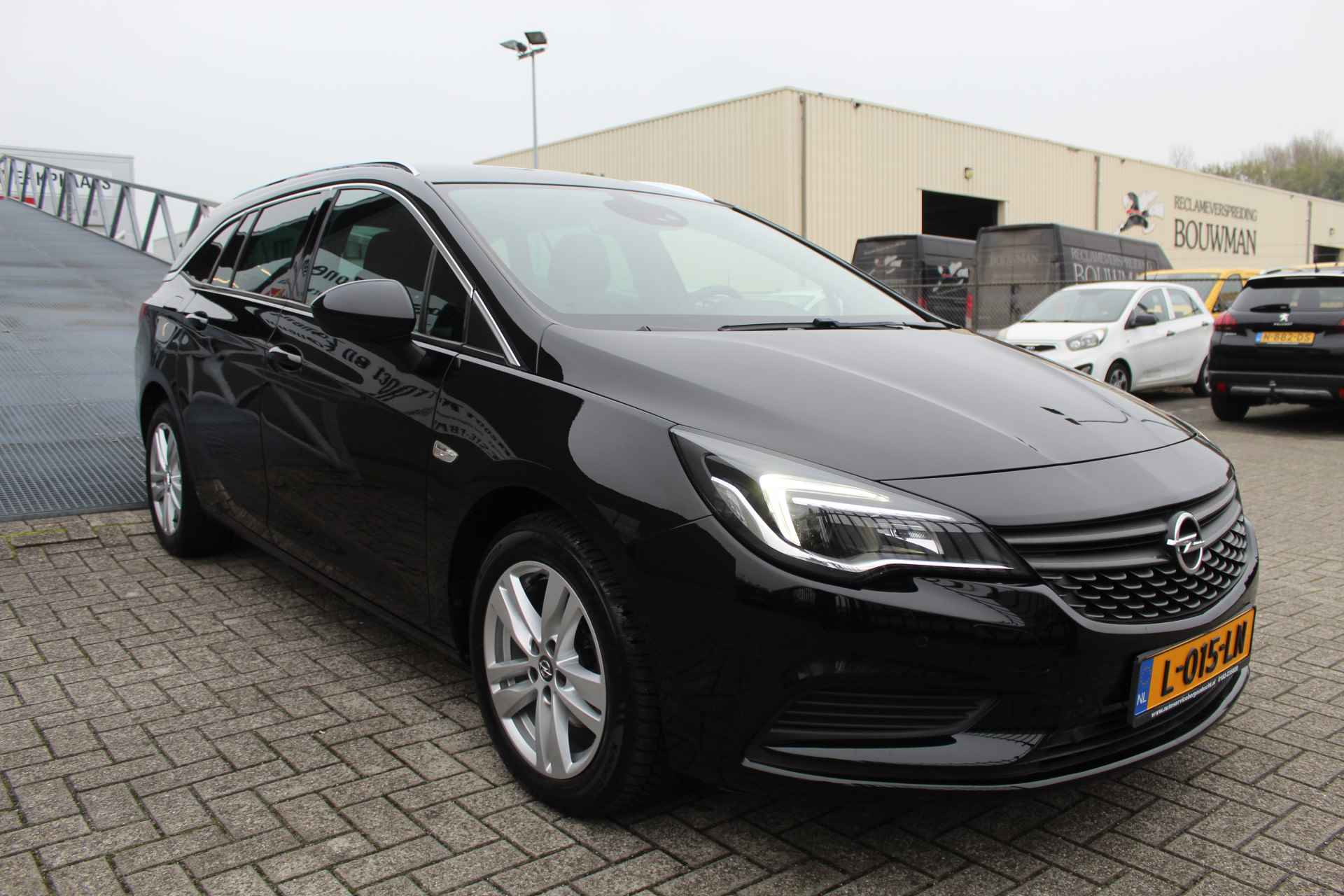 Opel Astra Sports Tourer 1.4 Turbo Trekhaak/Apple & Android Carplay/Stoel & Stuur Verwarming/Navigatie/Bluetooth. - 5/25