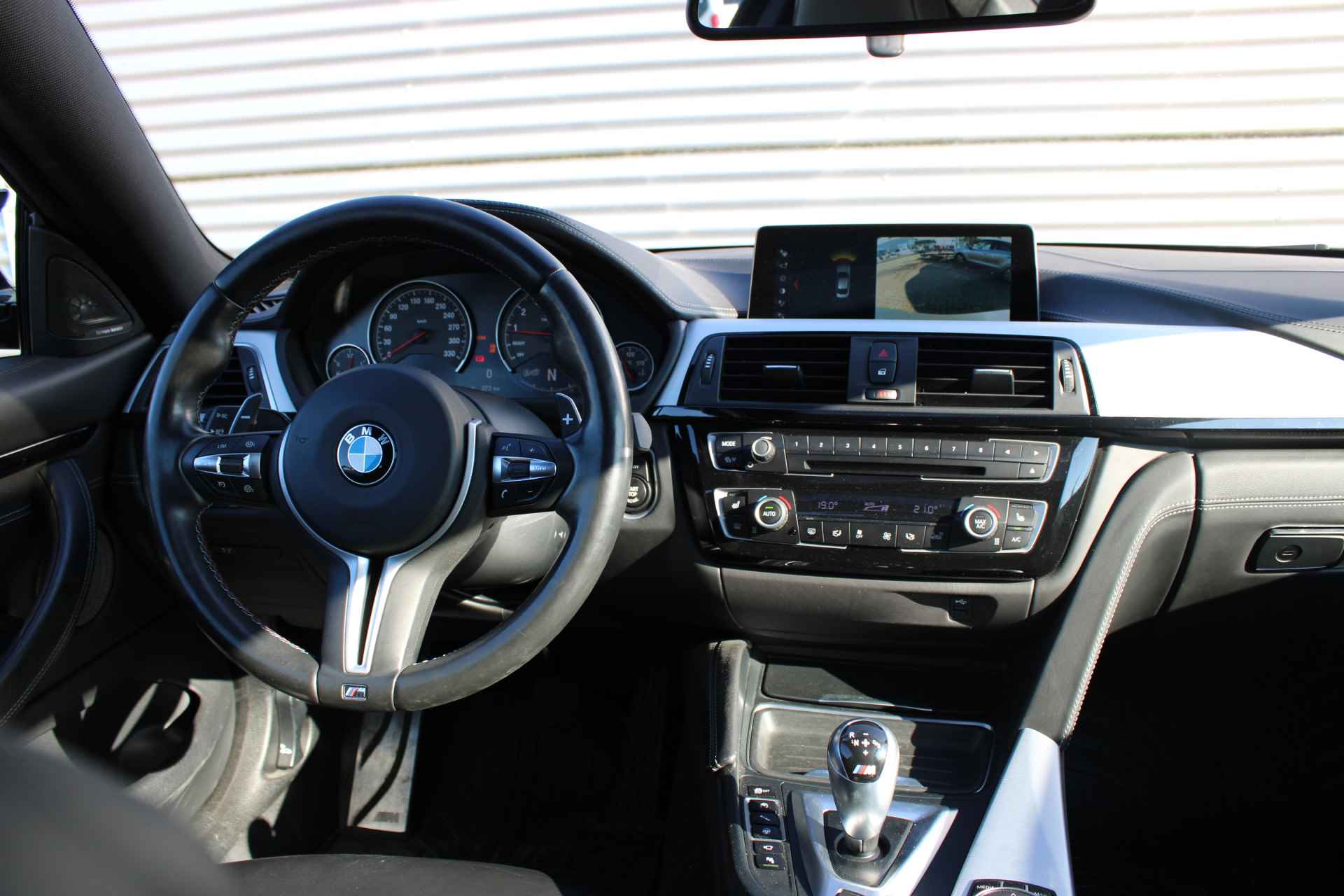 BMW 4 Serie Coupé M4 Competition High Executive Automaat / Schuif-kanteldak / Achteruitrijcamera / M Carbon-keramisch remmen / Adaptieve LED / Head-Up / Adaptief M onderstel / Comfort Access - 11/26