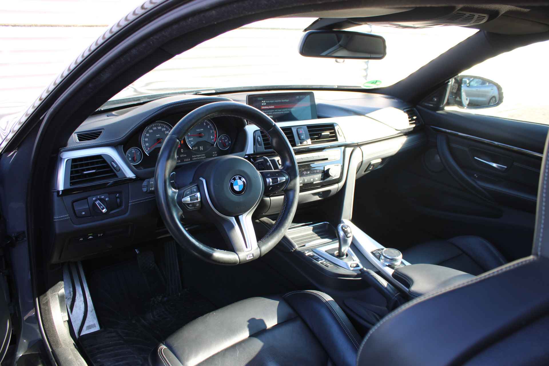 BMW 4 Serie Coupé M4 Competition High Executive Automaat / Schuif-kanteldak / Achteruitrijcamera / M Carbon-keramisch remmen / Adaptieve LED / Head-Up / Adaptief M onderstel / Comfort Access - 12/26