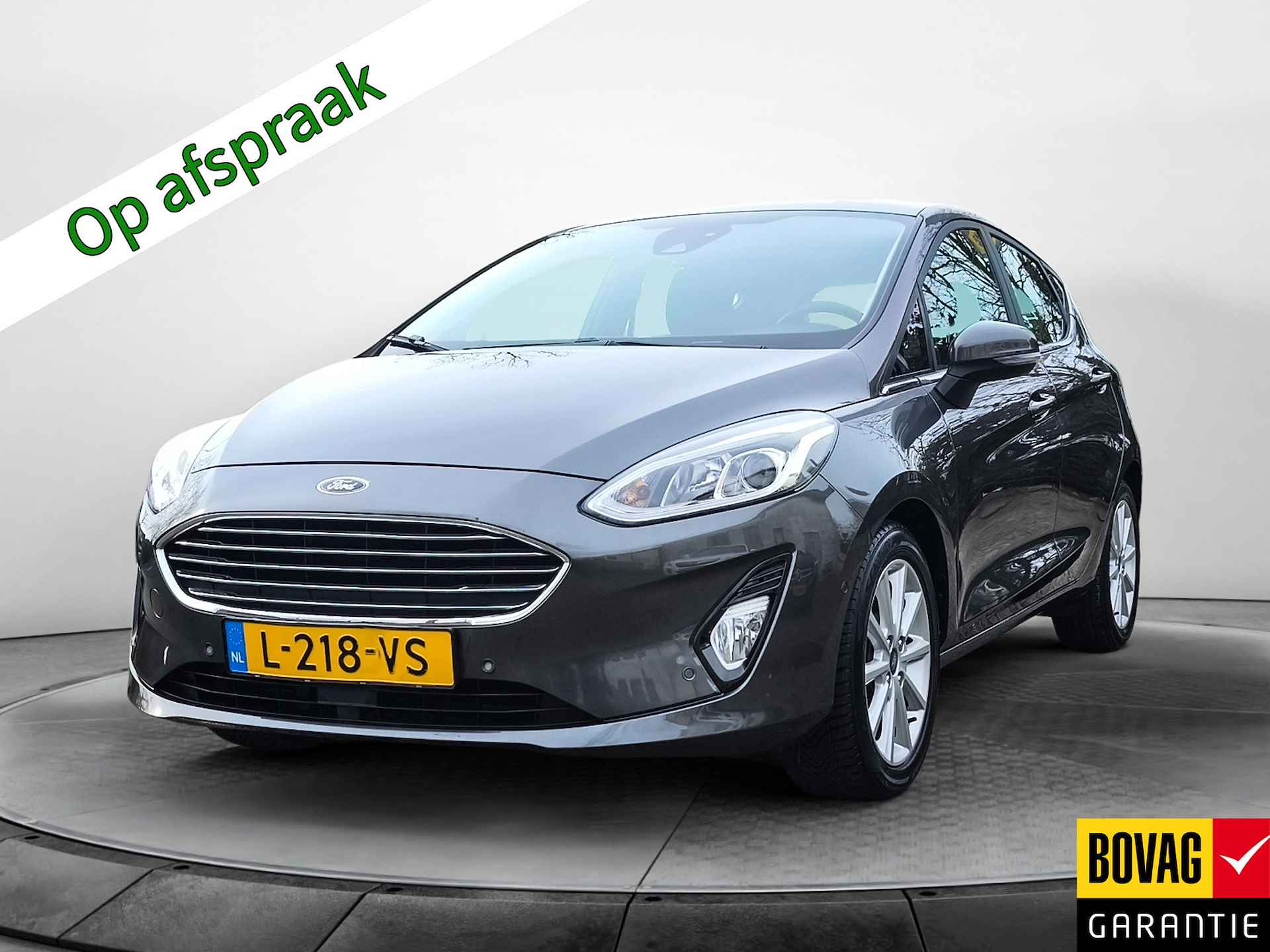 Ford Fiesta 1.0 EcoBoost Titanium (100 PK) 1e-Eig. & Dealer-Onderh. BOVAG-Garantie. Navigatie/Apple-Carplay/Android-Auto, Adaptive-Cruisecontrol, Parkeersensoren-V+A. Achteruitrijcamera, Stoelverwarming, Sportstoelen, Lm-Velgen-16I Privacy-Glas