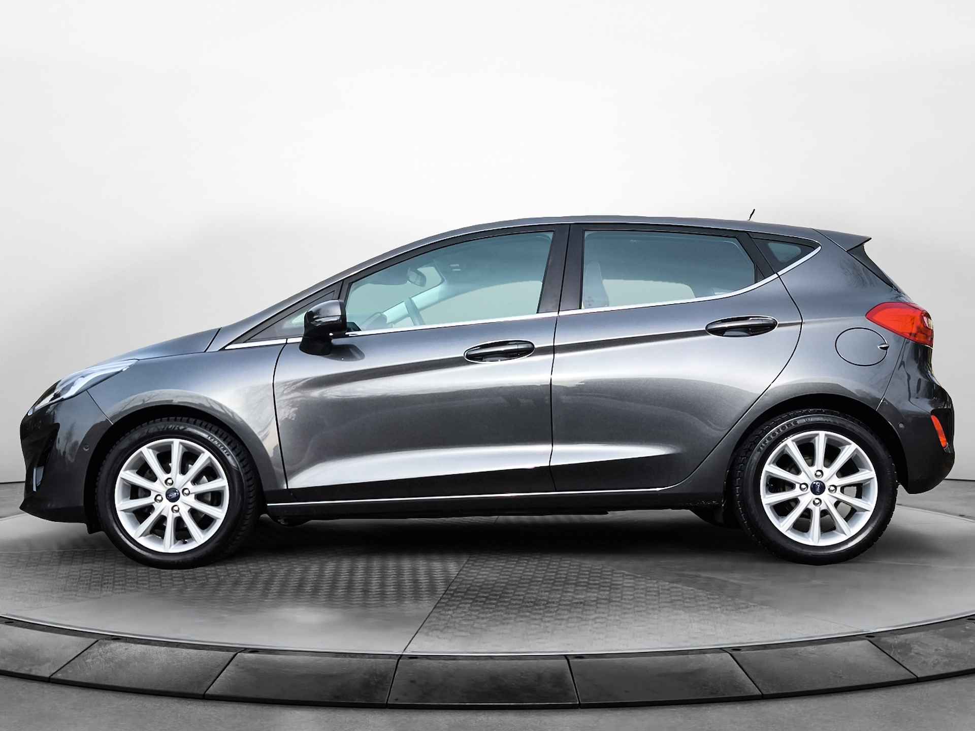 Ford Fiesta 1.0 EcoBoost Titanium (100 PK) 1e-Eig. Ford-Dealer-Onderh. BOVAG-Garantie. Navigatie/Apple-Carplay/Android-Auto, Adaptive-Cruisecontrol, Parkeersensoren-V+A. Achteruitrijcamera, Stoelverwarming, Sportstoelen, Lm-Velgen-16I Privacy-Glas - 9/43