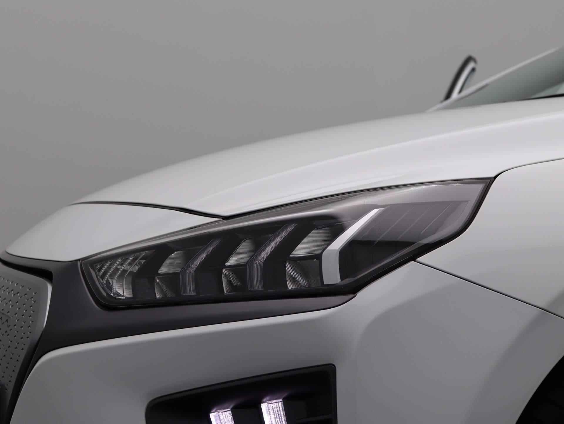 Hyundai IONIQ Premium EV 38 kWh | SEPP subsidie mogelijk | Trekhaak Afneembaar | Airco | Cruise Control | Lederen bekleding | Navigatie | LED | - 14/51