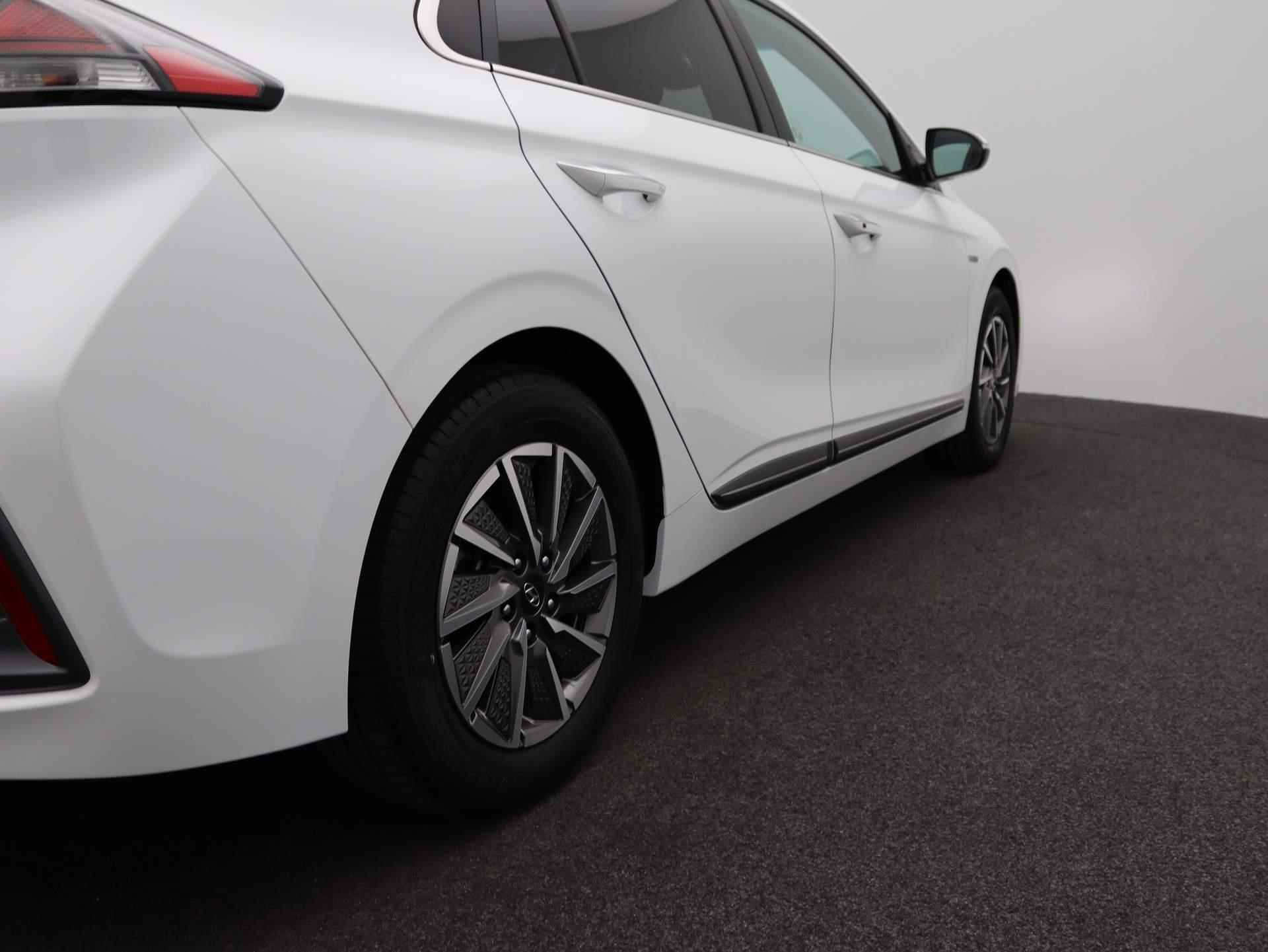 Hyundai IONIQ Premium EV 38 kWh | SEPP subsidie mogelijk | Trekhaak Afneembaar | Airco | Cruise Control | Lederen bekleding | Navigatie | LED | - 41/51