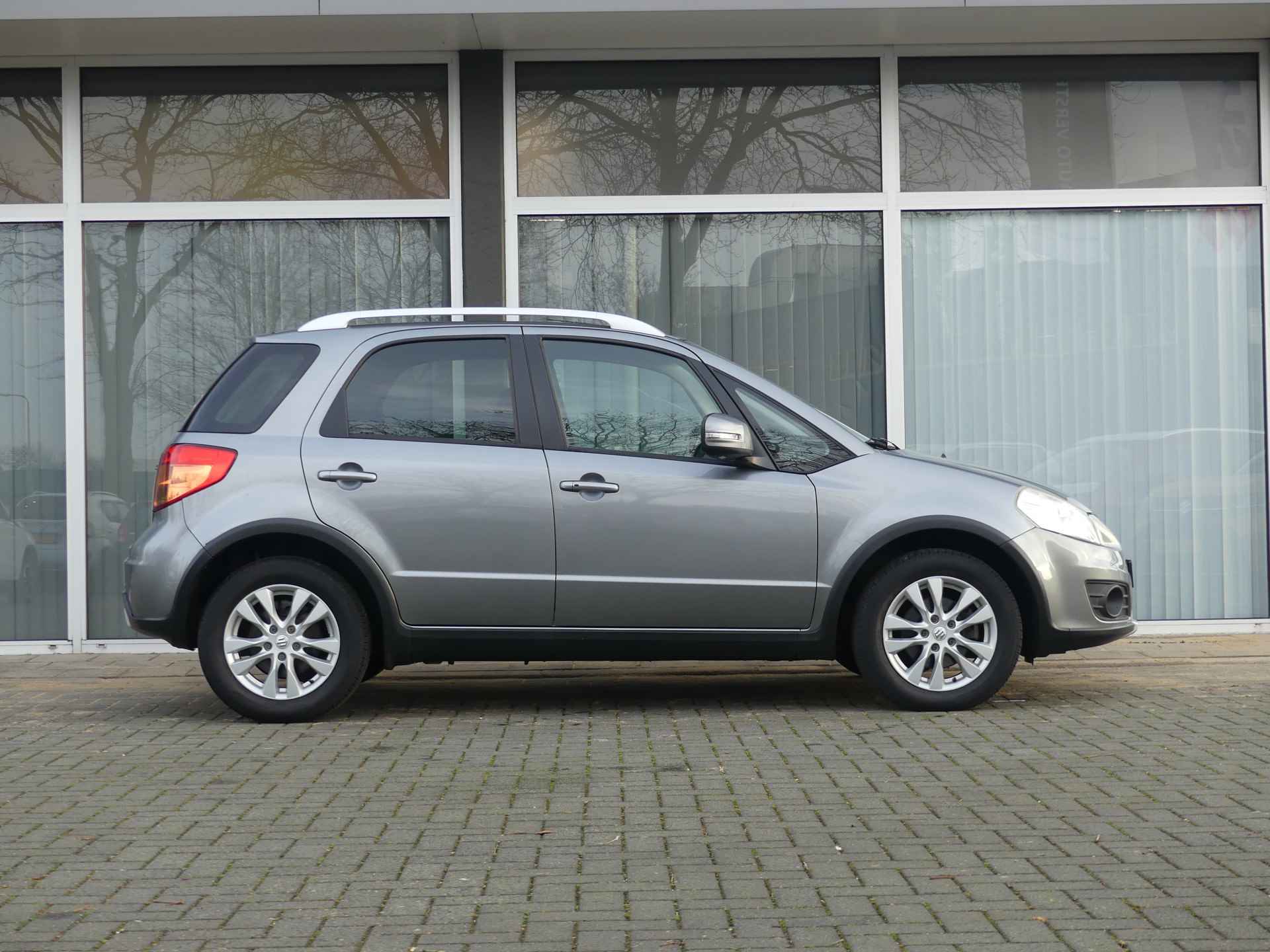 Suzuki SX4 1.6 Expressive, 1e Eigenaar, Airco, Navigatie, Keyless entry/start - 3/29