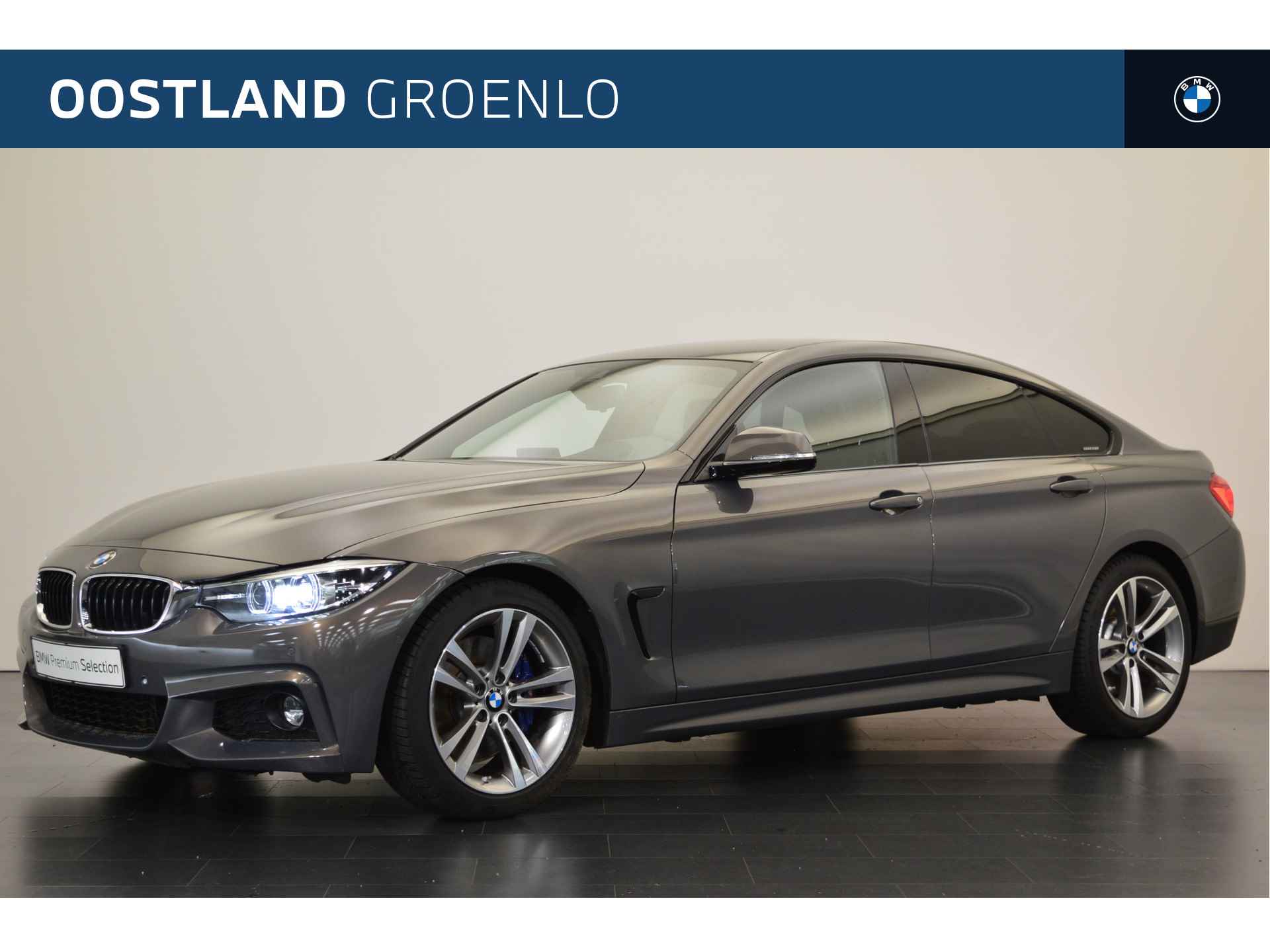 BMW 4 Serie Gran Coupé 420i High Executive M Sport Automaat / Sportstoelen / Stoelverwarming / Achteruitrijcamera / Park Assistant / Head-Up / Leder / Navigatie Professional - 1/22