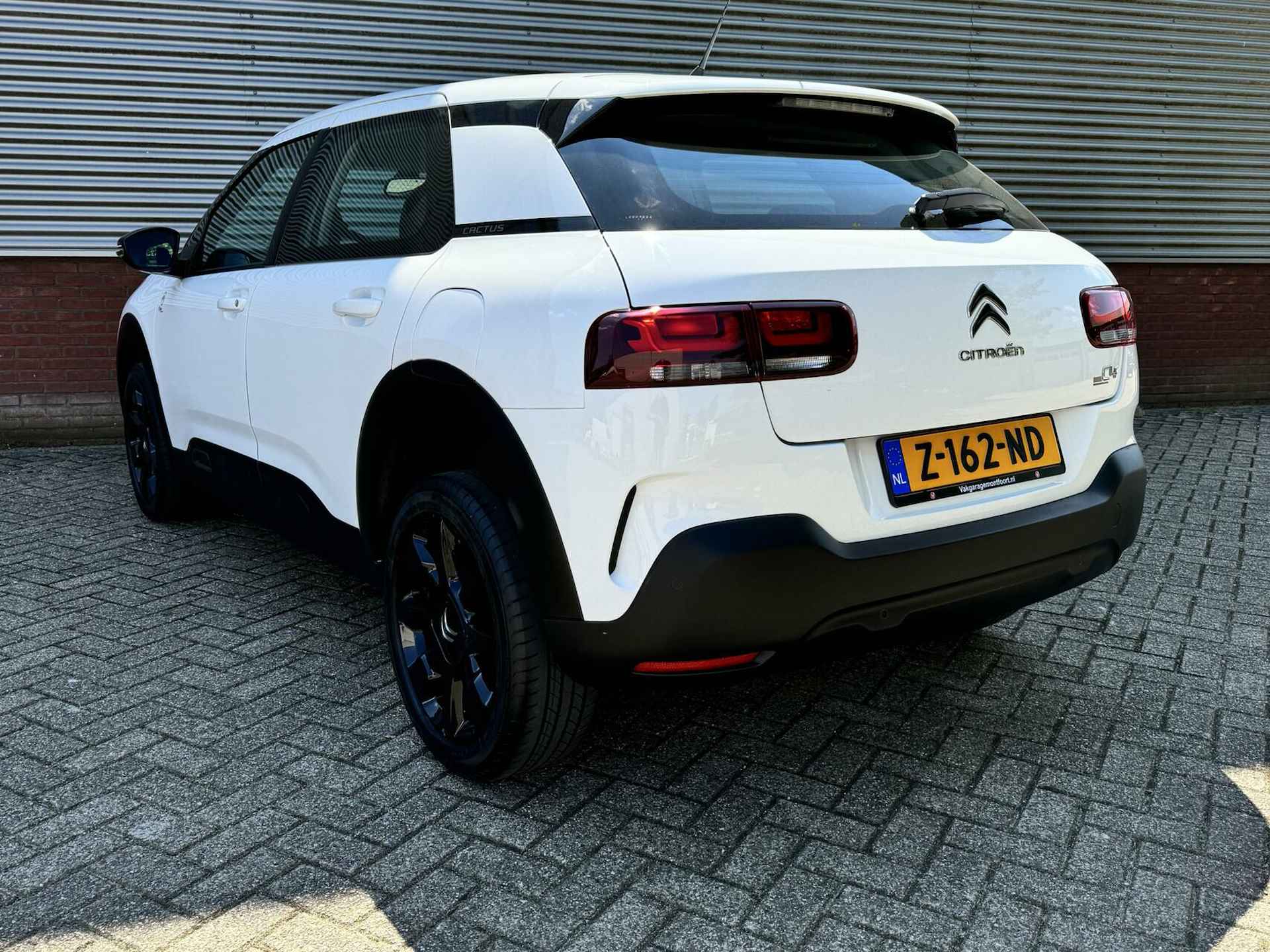 Citroen C4 Cactus 1.2 PureTech Origins 5 drs|35728 km!|Airco|Navi|Cruise|Apple/Android Carplay|Parkeerseosoren achter|L.M. wielen. - 7/36