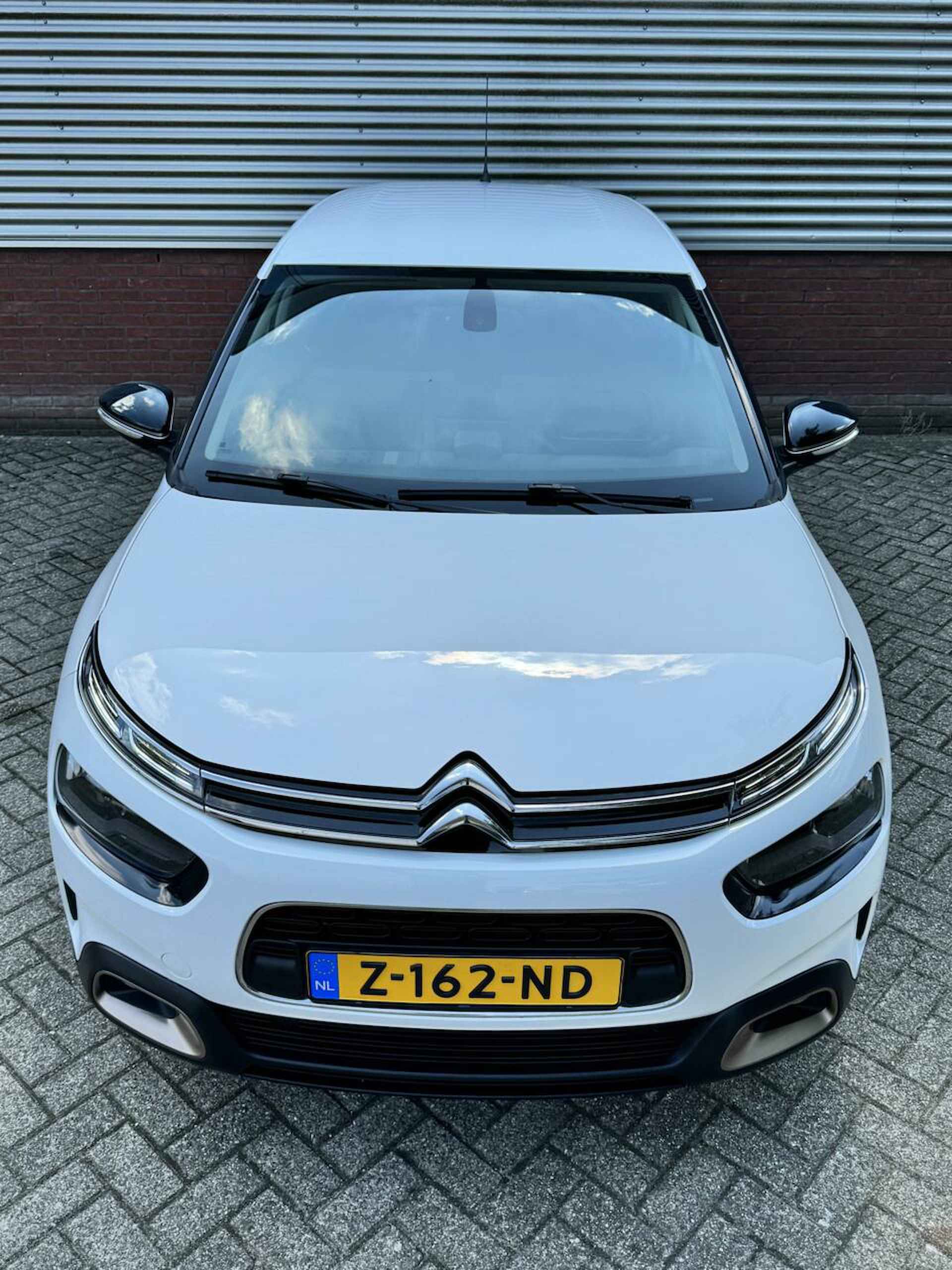 Citroen C4 Cactus 1.2 PureTech Origins 5 drs|35728 km!|Airco|Navi|Cruise|Apple/Android Carplay|Parkeerseosoren achter|L.M. wielen. - 11/36