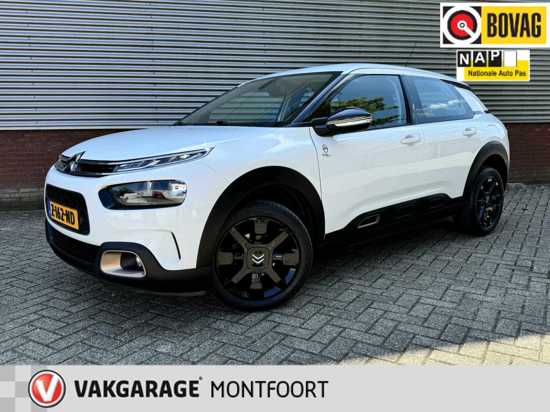 Citroen C4 Cactus 1.2 PureTech Origins 5 drs|35728 km!|Airco|Navi|Cruise|Apple/Android Carplay|Parkeerseosoren achter|L.M. wielen. - 1/36