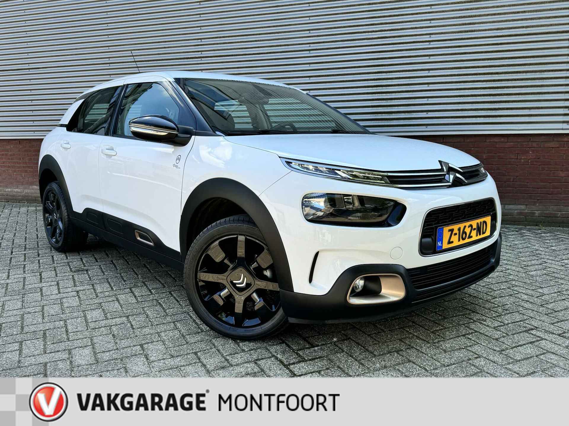 Citroen C4 Cactus 1.2 PureTech Origins 5 drs|35728 km!|Airco|Navi|Cruise|Apple/Android Carplay|Parkeerseosoren achter|L.M. wielen. - 3/36