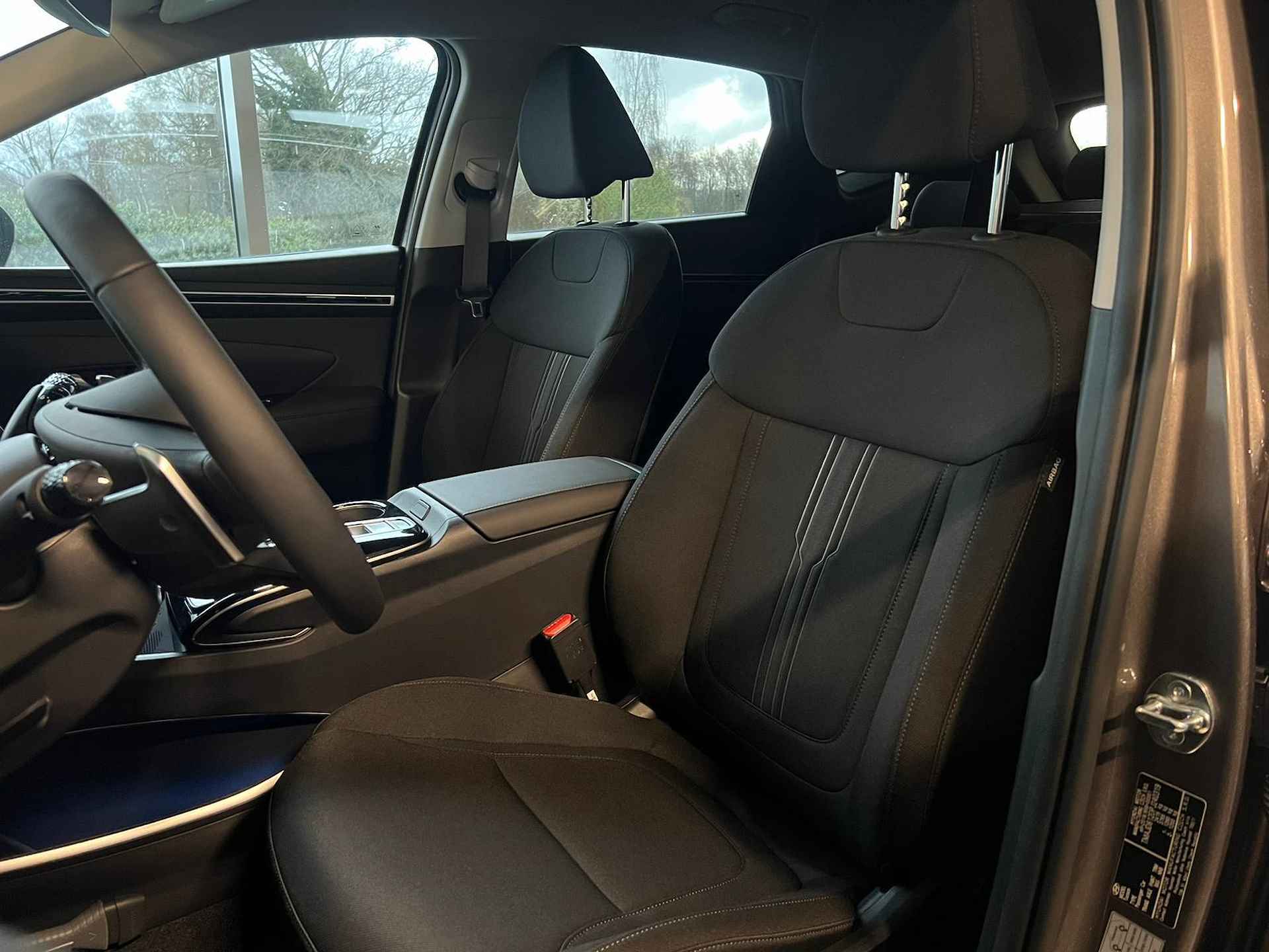 Hyundai Tucson 1.6 T-GDI PHEV Comfort Smart 4WD / €8.500,- Prijsvoordeel! / Rijklaarprijs / Direct Leverbaar / Navigatie + Apple Carplay/Android Auto / Climate Control / Keyless Entry & Start / - 21/28