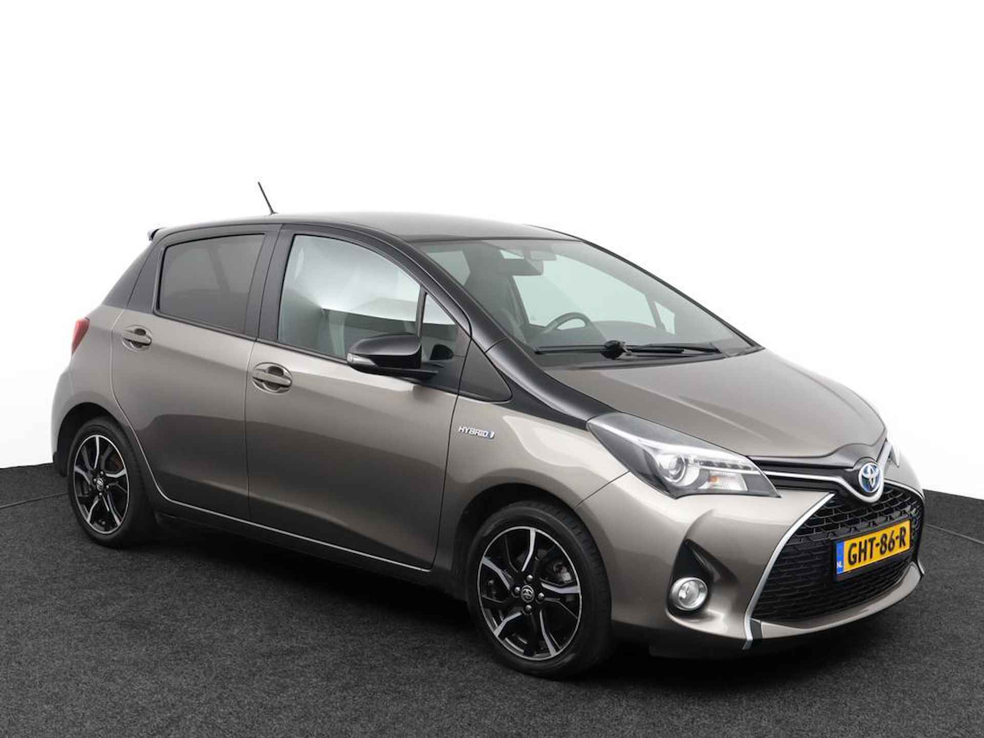 Toyota Yaris 1.5 Hybrid Dynamic Bi-Tone | Full map navigatie | Keyless entry en start | - 14/50