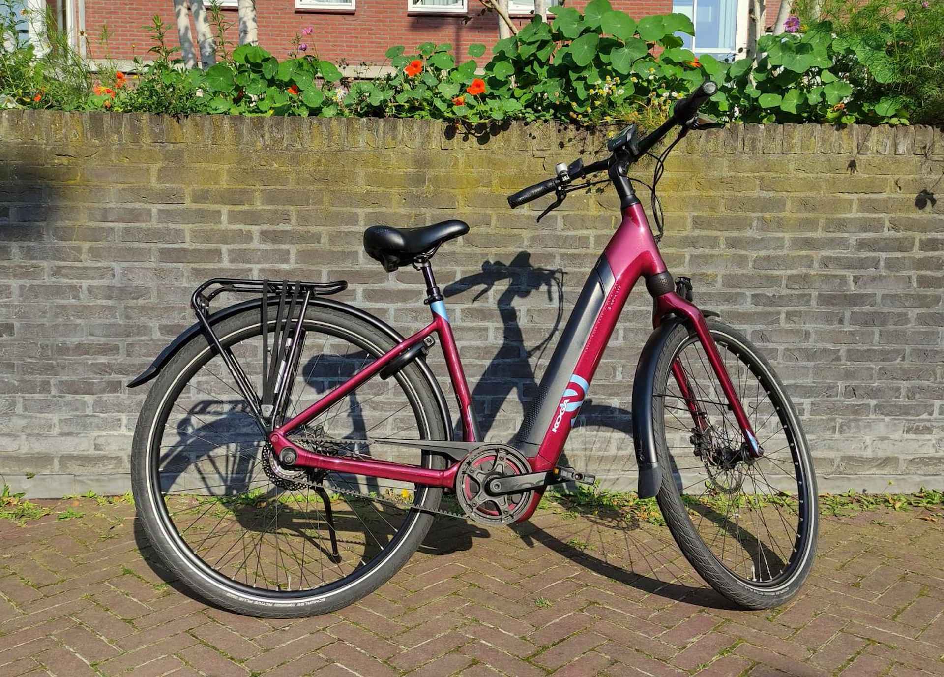 Koga E-Nova Evo PT D47 N8 Elektrische Stadsfietsen dark cherry - 1/2