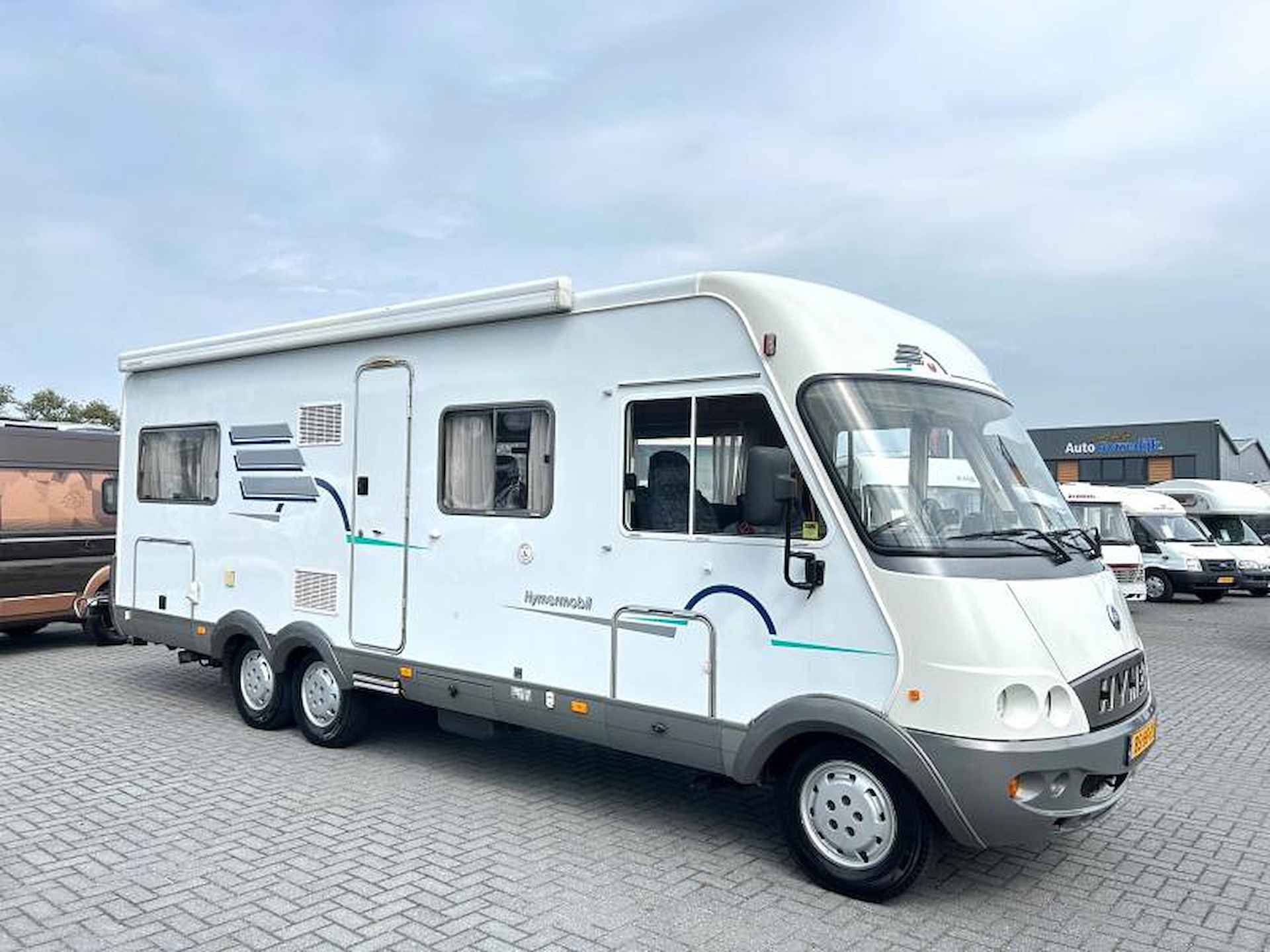 Hymer B 754 vastbed/2xAirco/xxl/7.60m - 3/23