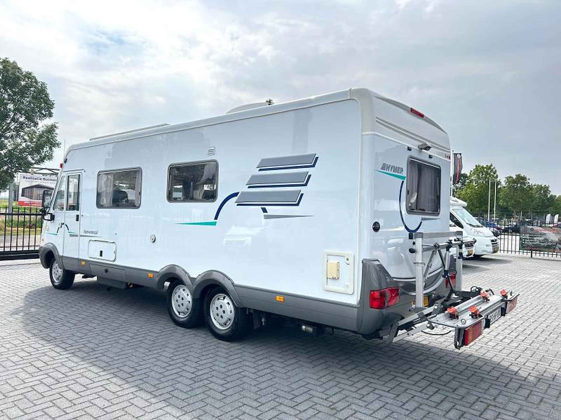 Hymer B 754 vastbed/2xAirco/xxl/7.60m - 5/23