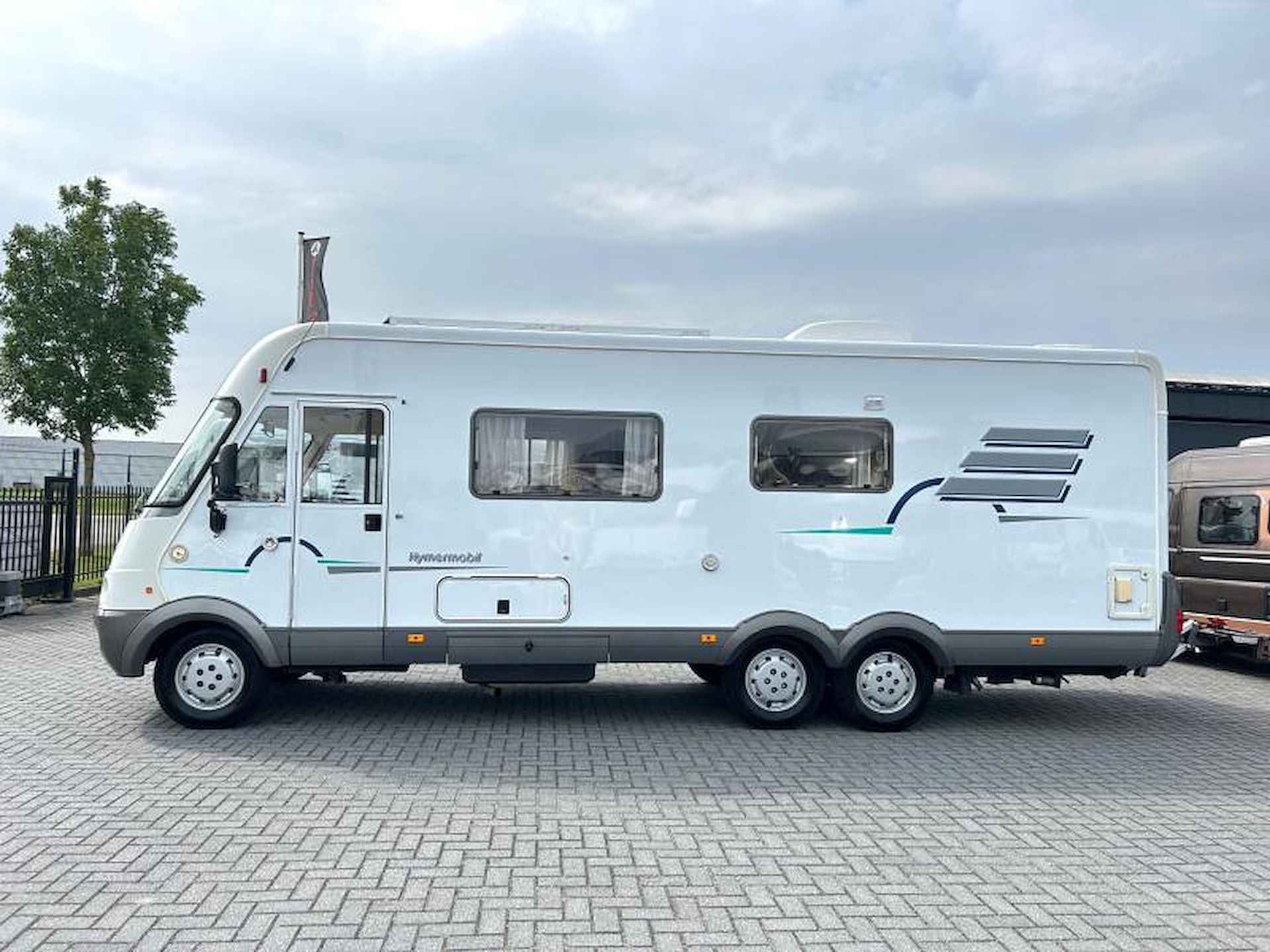 Hymer B 754 vastbed/2xAirco/xxl/7.60m - 21/23